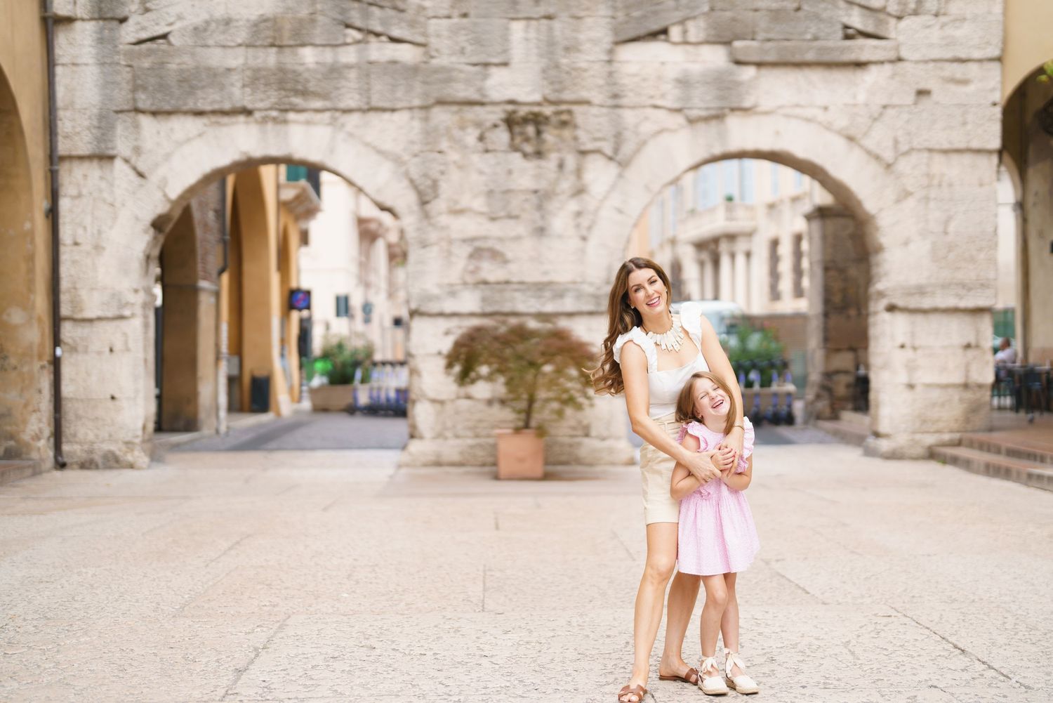 Romantic couple portrait in historic streets of Verona Italy by Verona family photographer