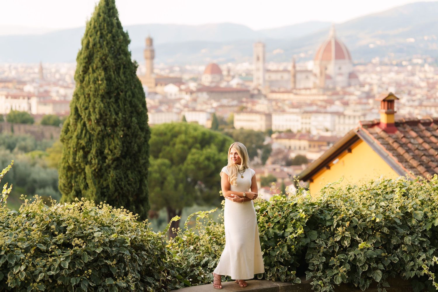 Panoramic view of Florence, Italy with the iconic Duomo cathedral dome rising above the historic cityscape.