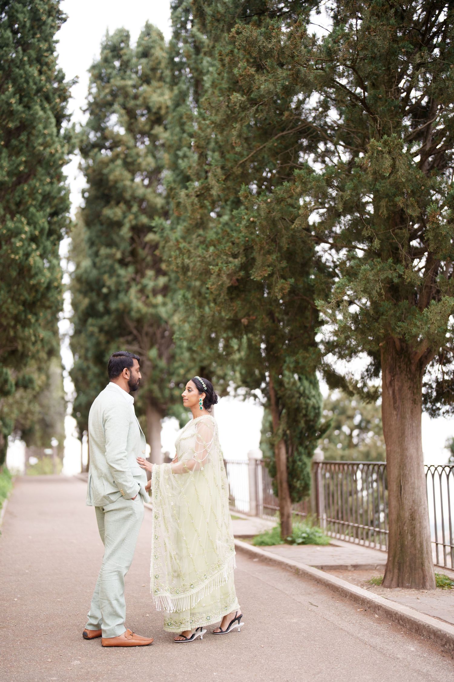 photographer verona romantic couple walking ponte pietra verona photographer elegant couple photoshoot verona italy