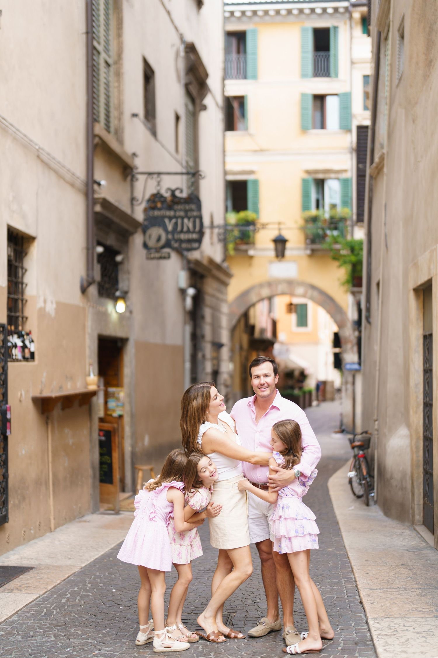 Romantic couple portrait in historic streets of Verona Italy by Verona family photographer