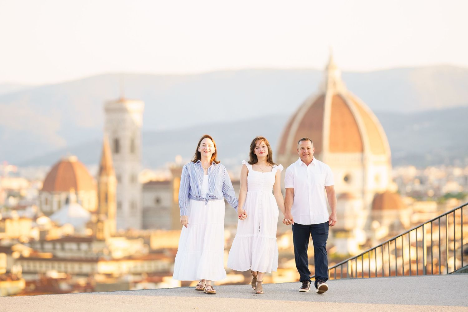 photographer Florence Italy skyline with iconic Duomo cathedral dome and historic architecture at sunset.