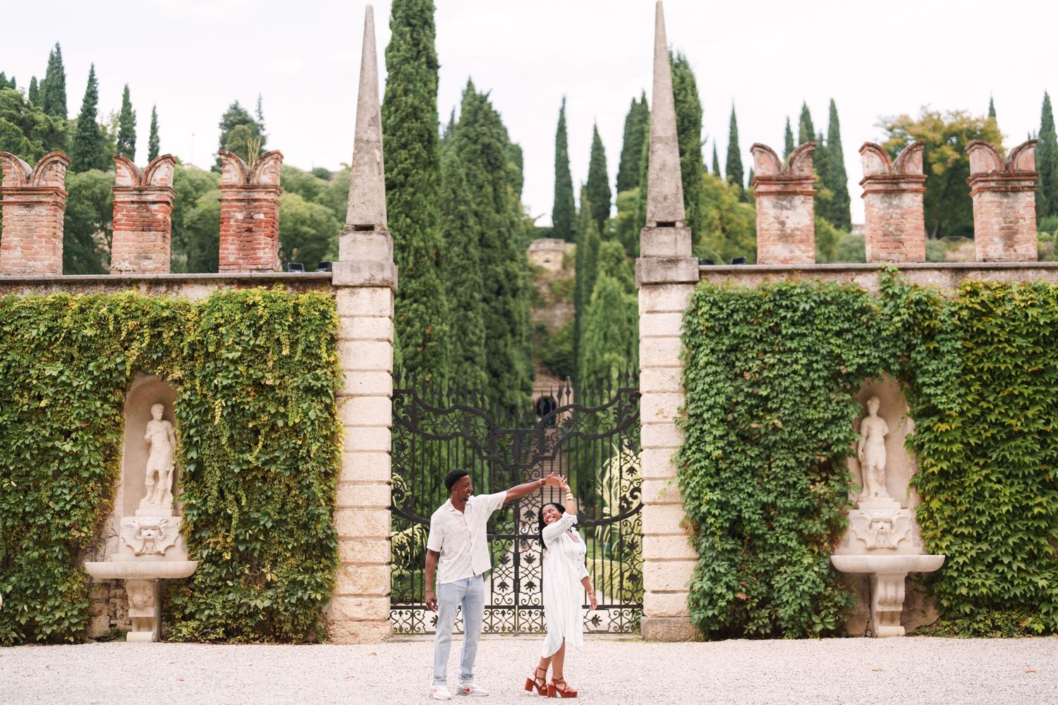 Happy engaged couple at Giardino Giusti Verona photographed by wedding photographer Italy Verona