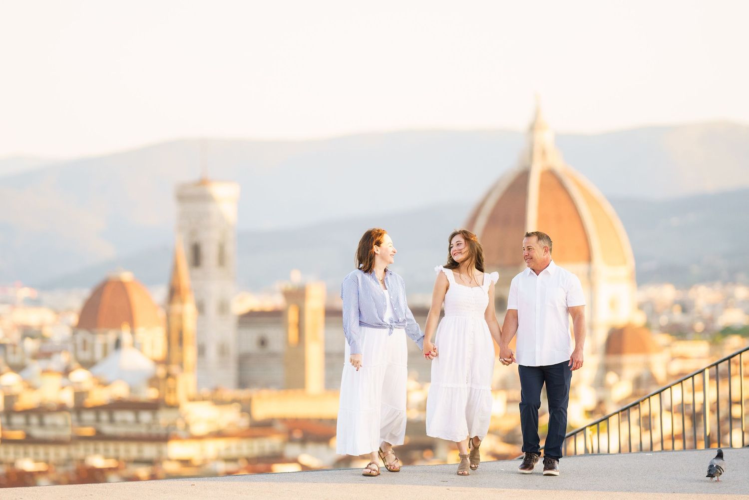 photographer Florence Italy skyline with iconic Duomo cathedral dome and historic architecture at sunset.