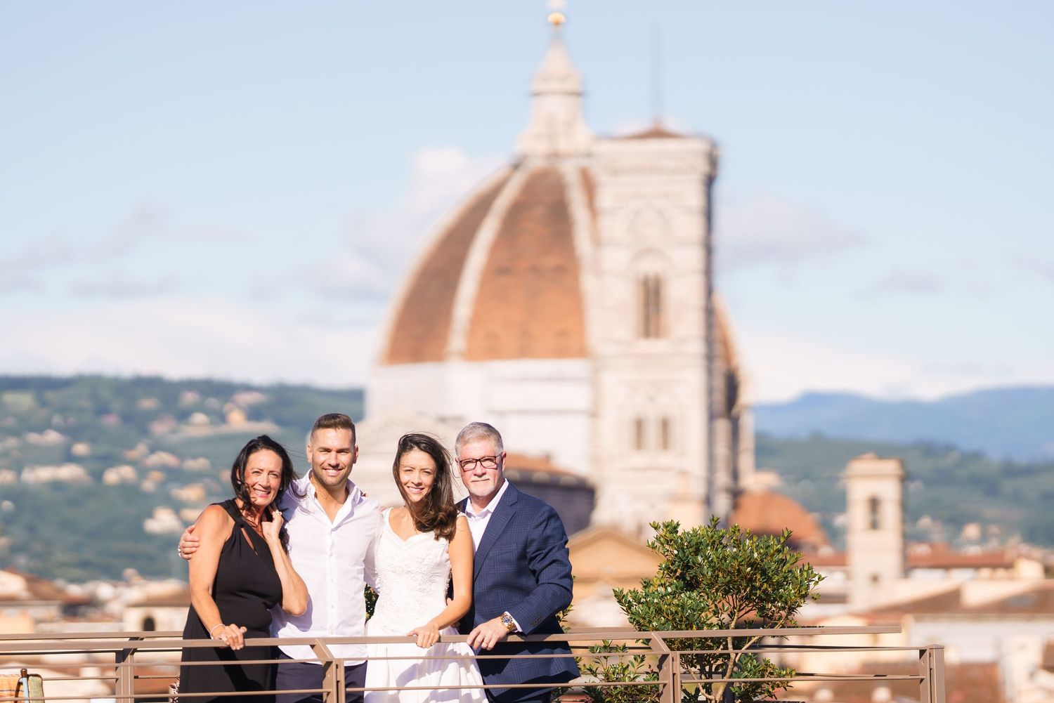 Scenic view of Florence skyline with iconic Duomo cathedral dome against blue sky.