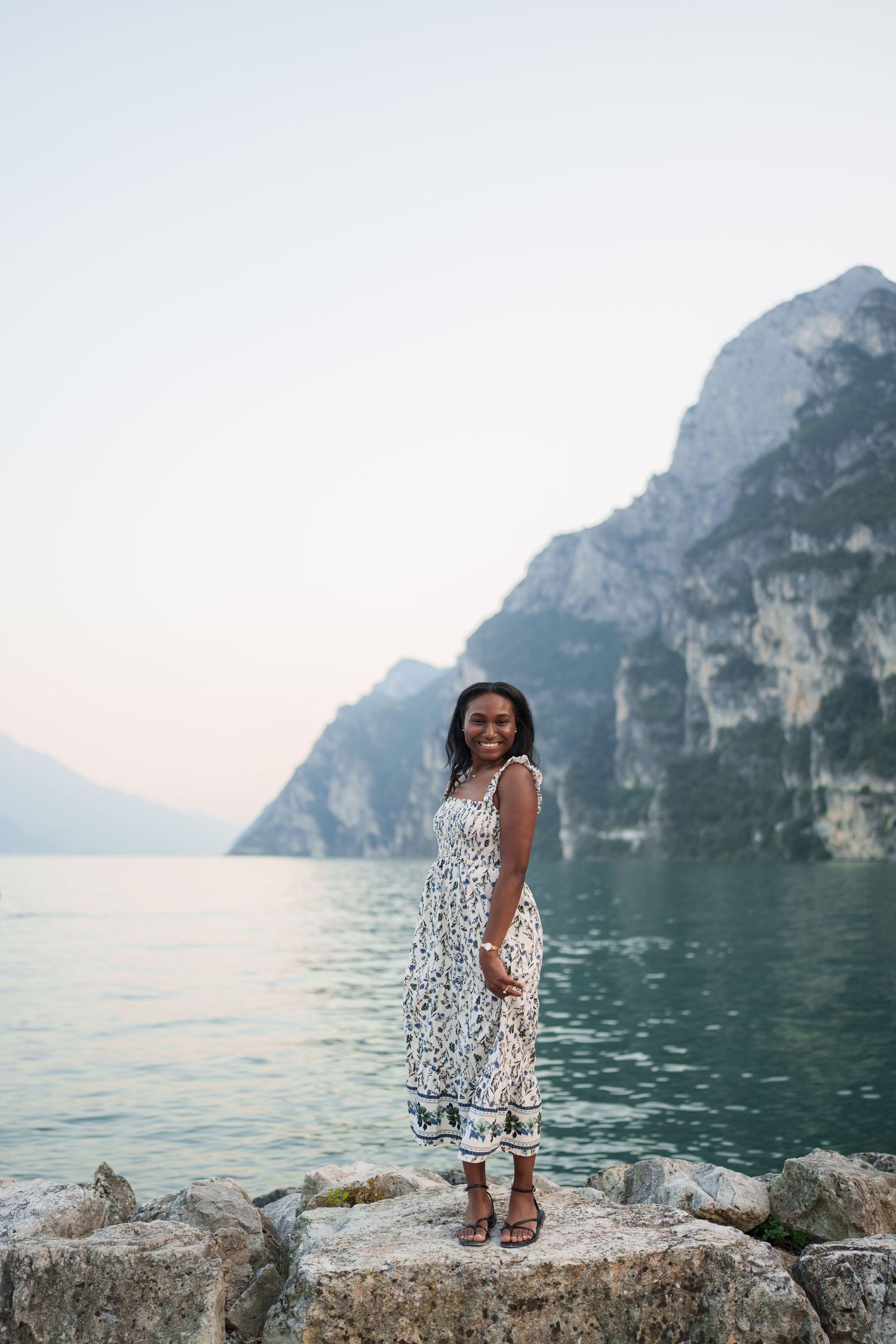 Emotional reaction during a surprise proposal beside Lake Garda in Riva del Garda