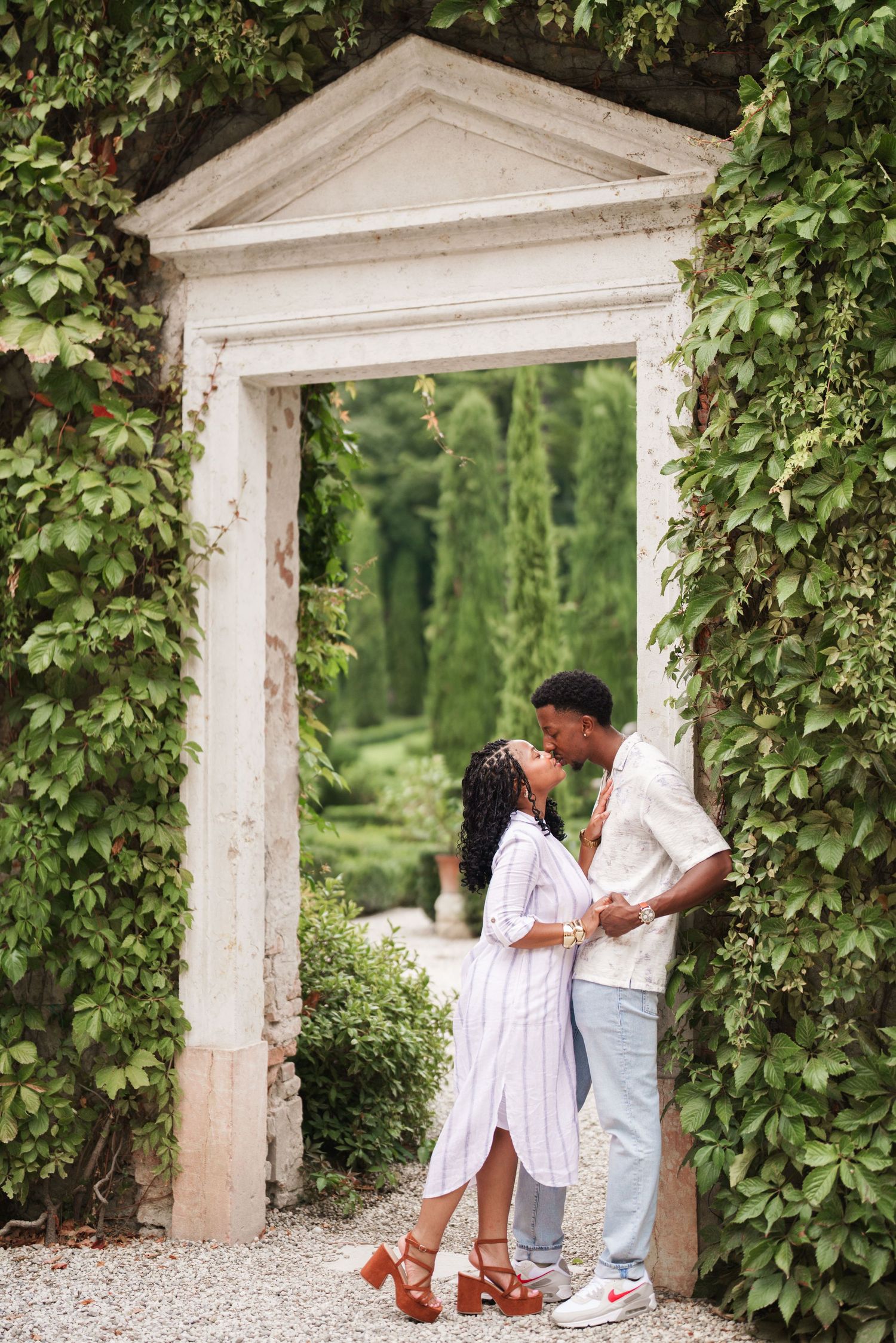 Proposal engagement photographer Verona capturing emotional couple portraits in historic Italian gardens