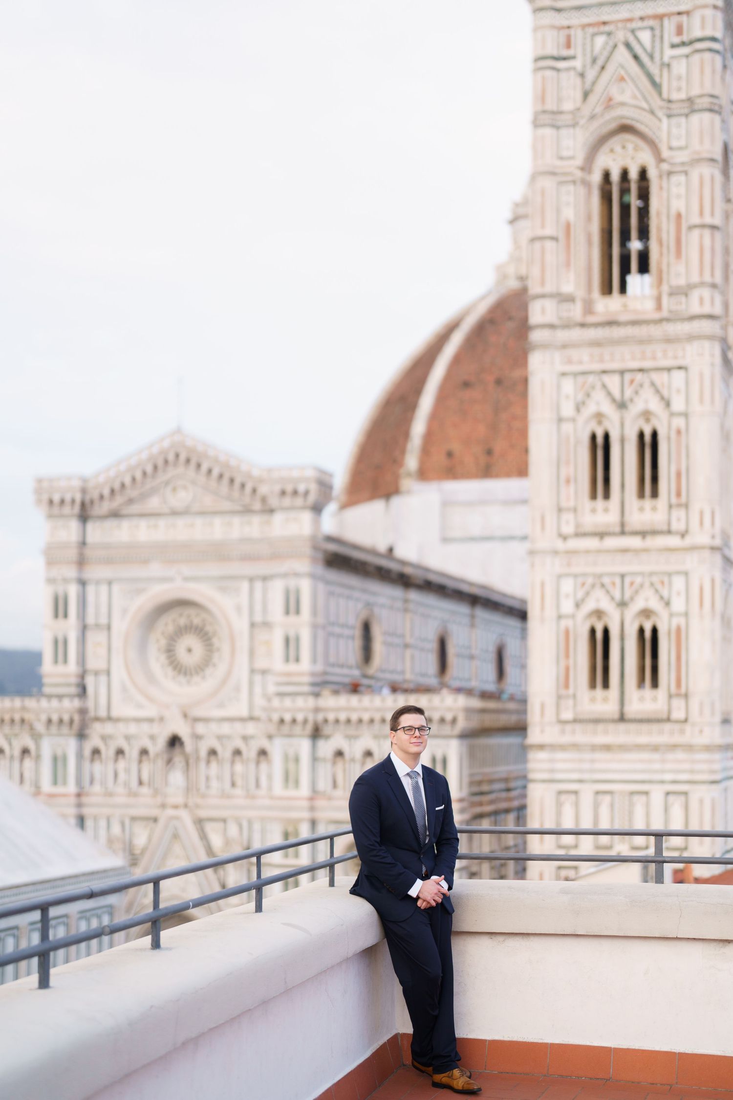 A series of four photos showing architectural details of the Florence Cathedral and Duomo against a bright sky.