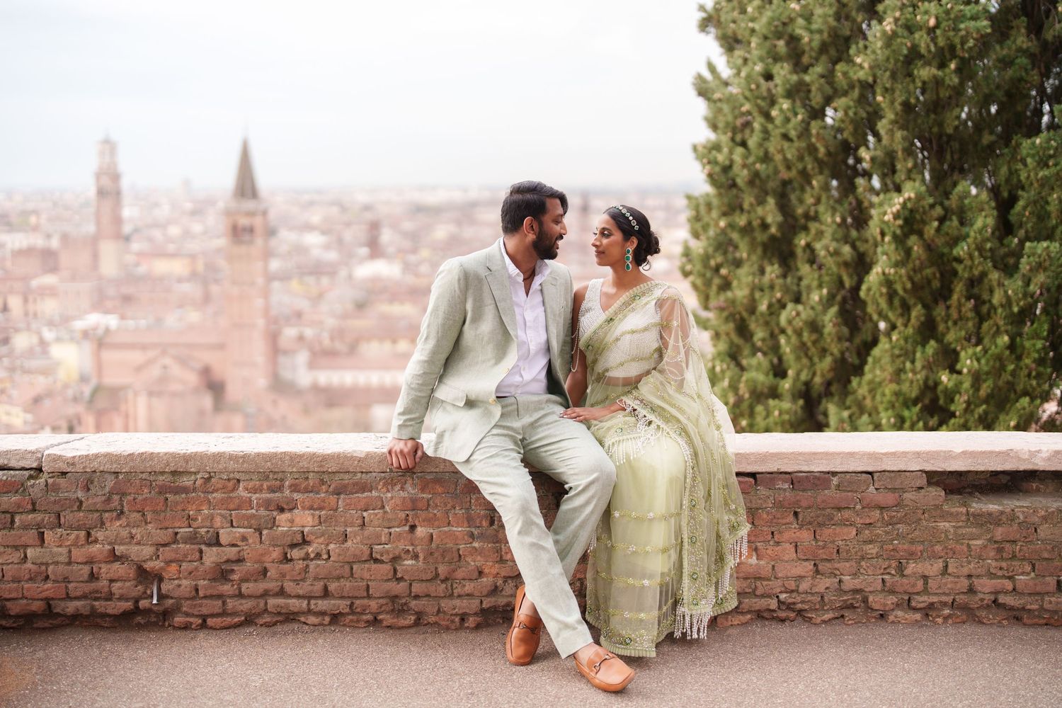 romantic couple portrait with panoramic view verona skyline couple photoshoot verona photographer