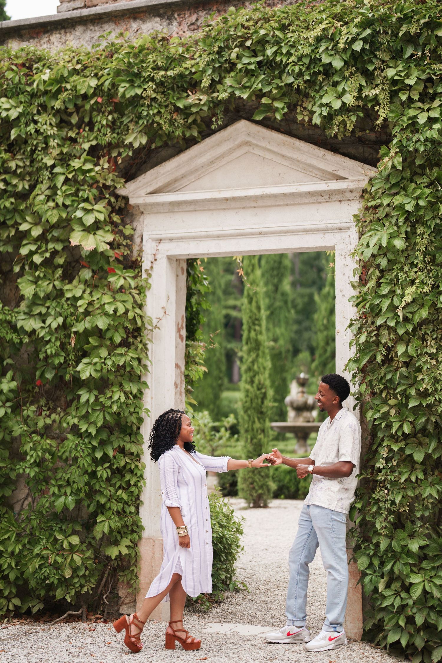 Proposal engagement photographer Verona capturing emotional couple portraits in historic Italian gardens