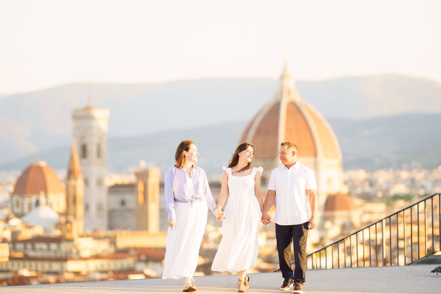 photographer Florence Italy skyline with iconic Duomo cathedral dome and historic architecture at sunset.