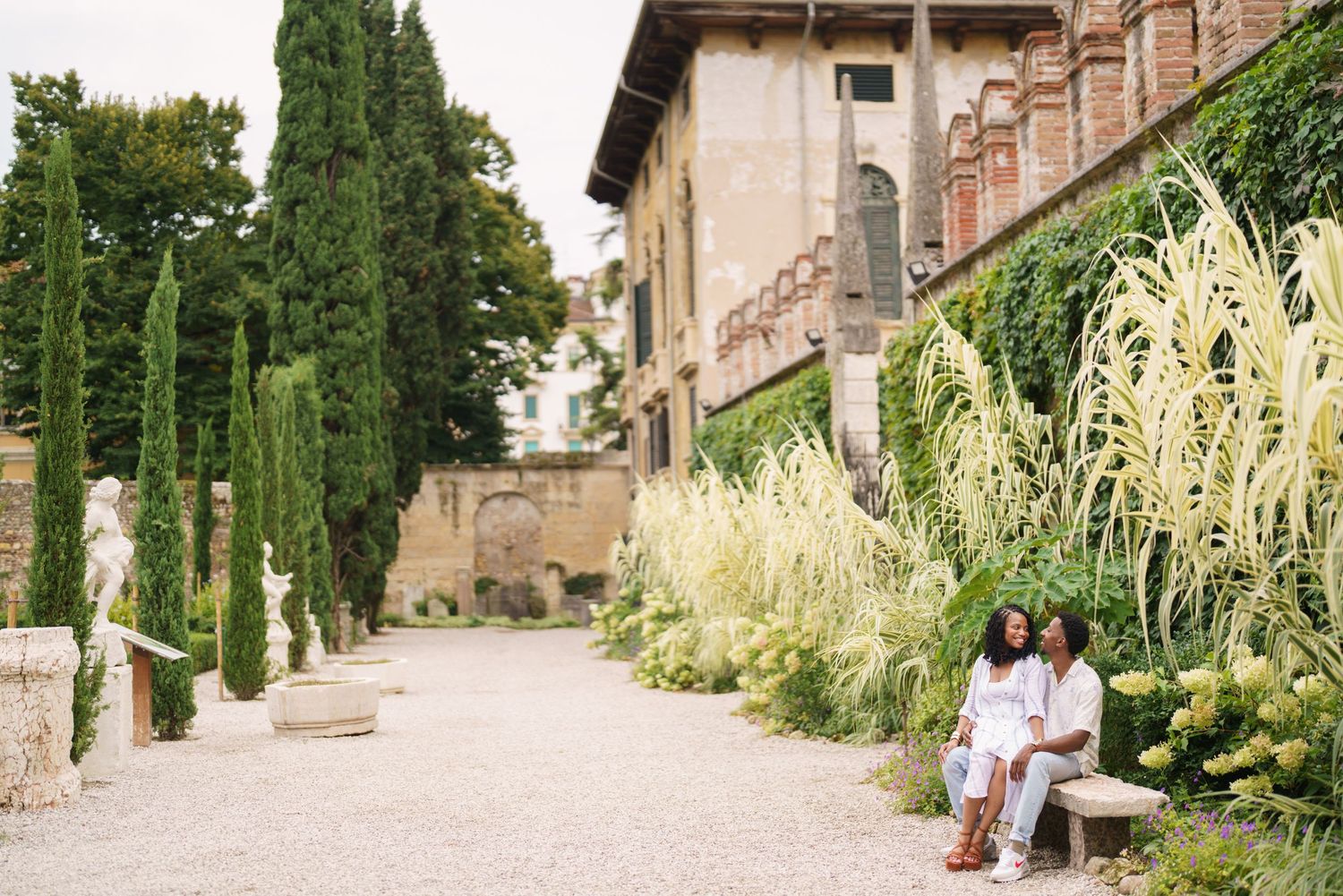 Proposal engagement photographer Verona capturing emotional couple portraits in historic Italian gardens