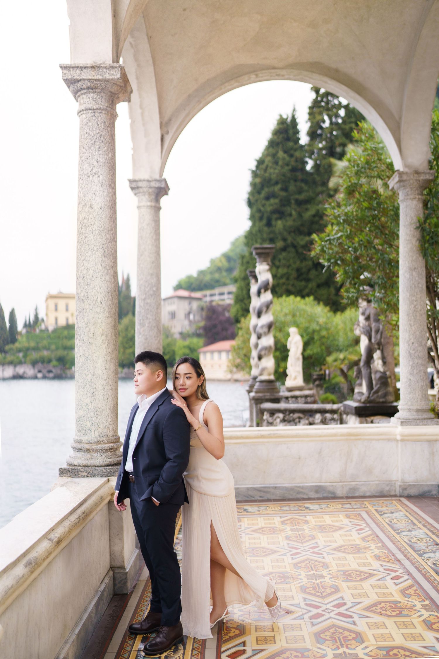 Lake Como proposal photographer capturing surprise engagement at Villa Monastero in Varenna
