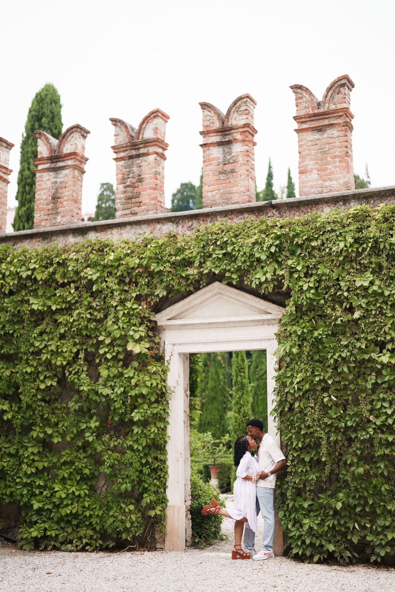 Proposal engagement photographer Verona capturing emotional couple portraits in historic Italian gardens