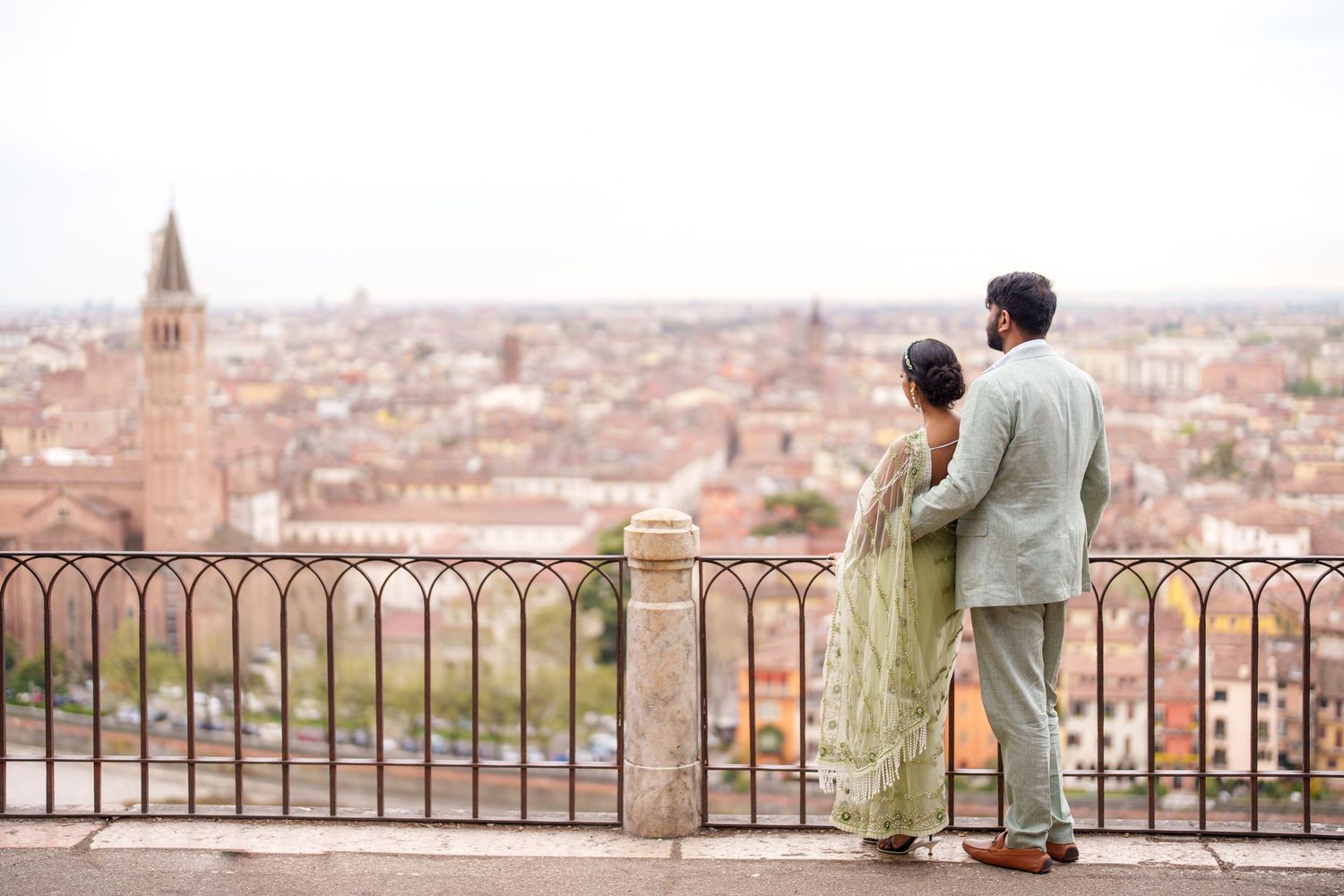 romantic couple walking ponte pietra verona photographer elegant couple photoshoot verona italy