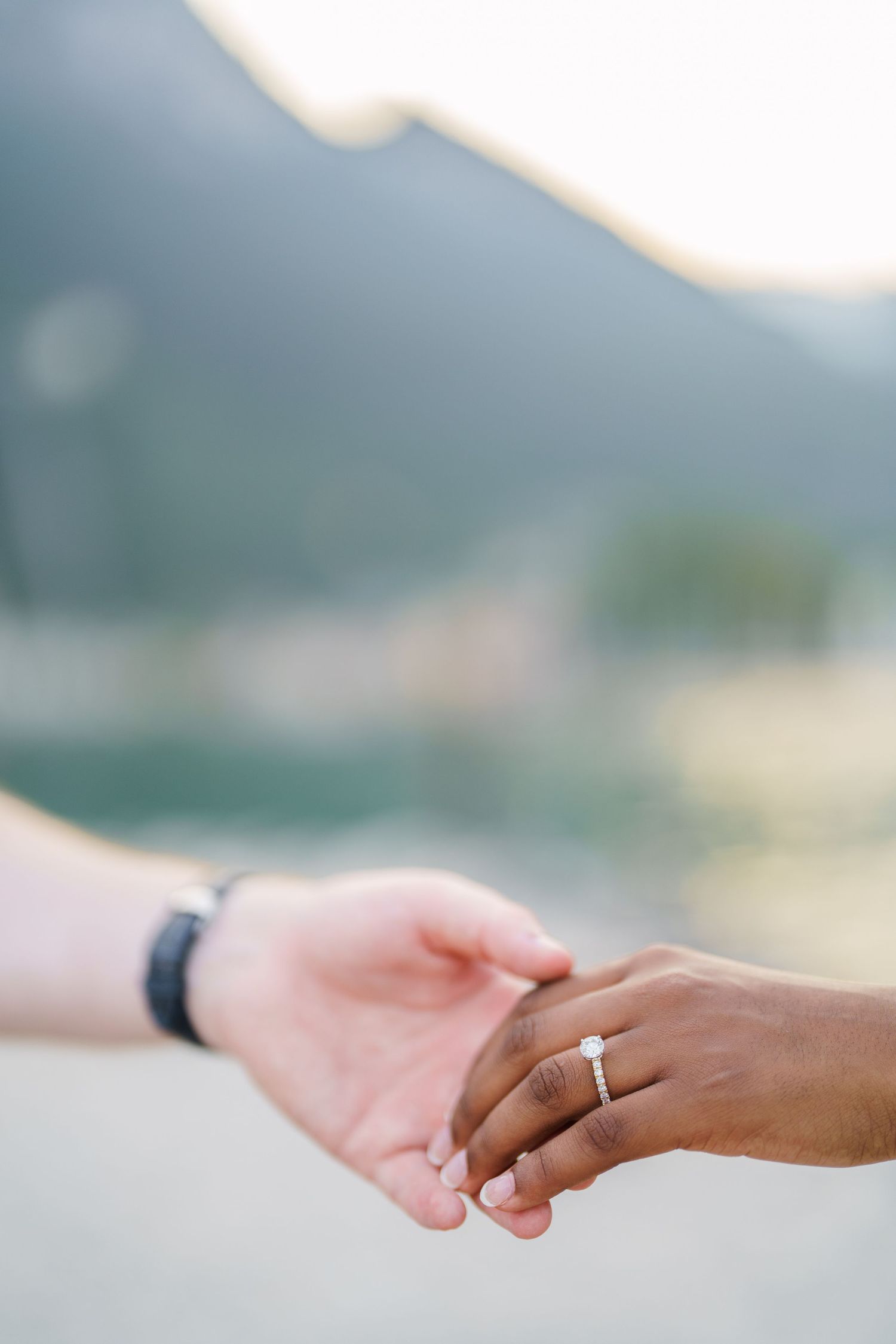 Emotional reaction during a surprise proposal beside Lake Garda in Riva del Garda