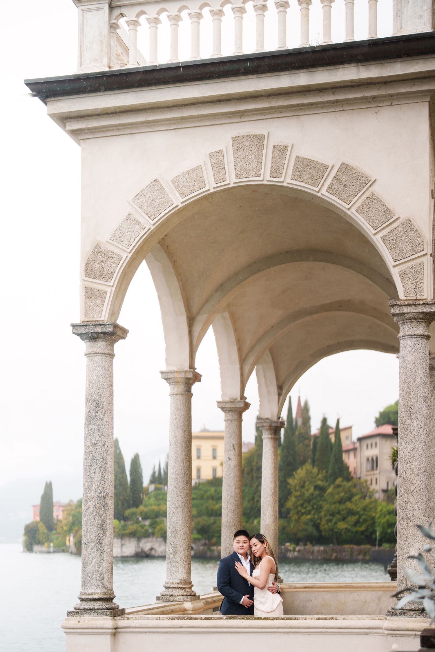 Lake Como proposal photographer capturing surprise engagement at Villa Monastero in Varenna