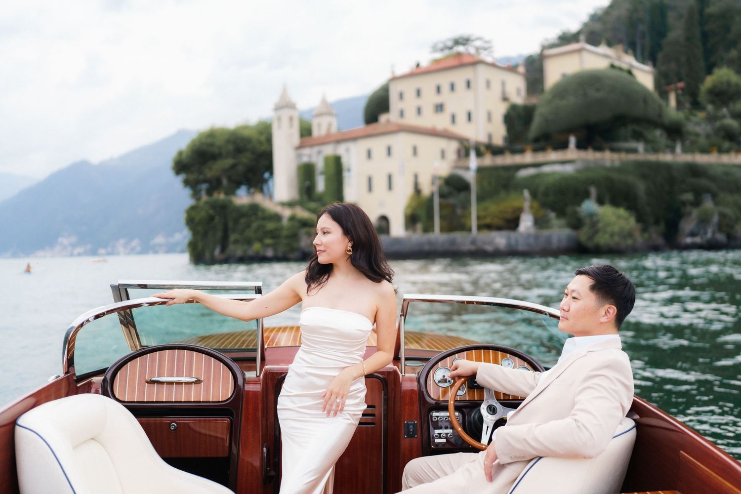 Lake Como proposal photographer capturing surprise engagement at Villa Monastero in Varenna