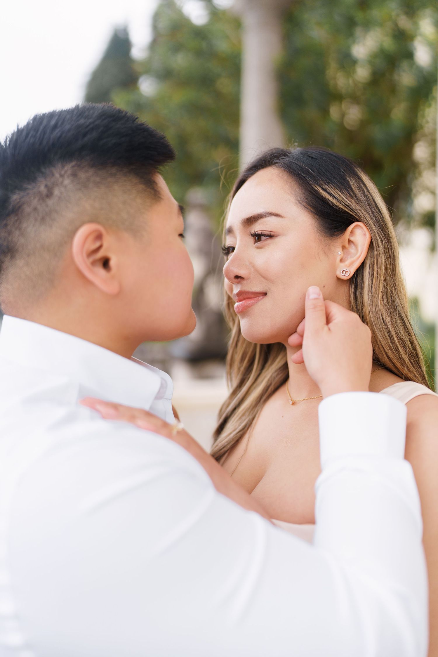 Lake Como proposal photographer capturing surprise engagement at Villa Monastero in Varenna