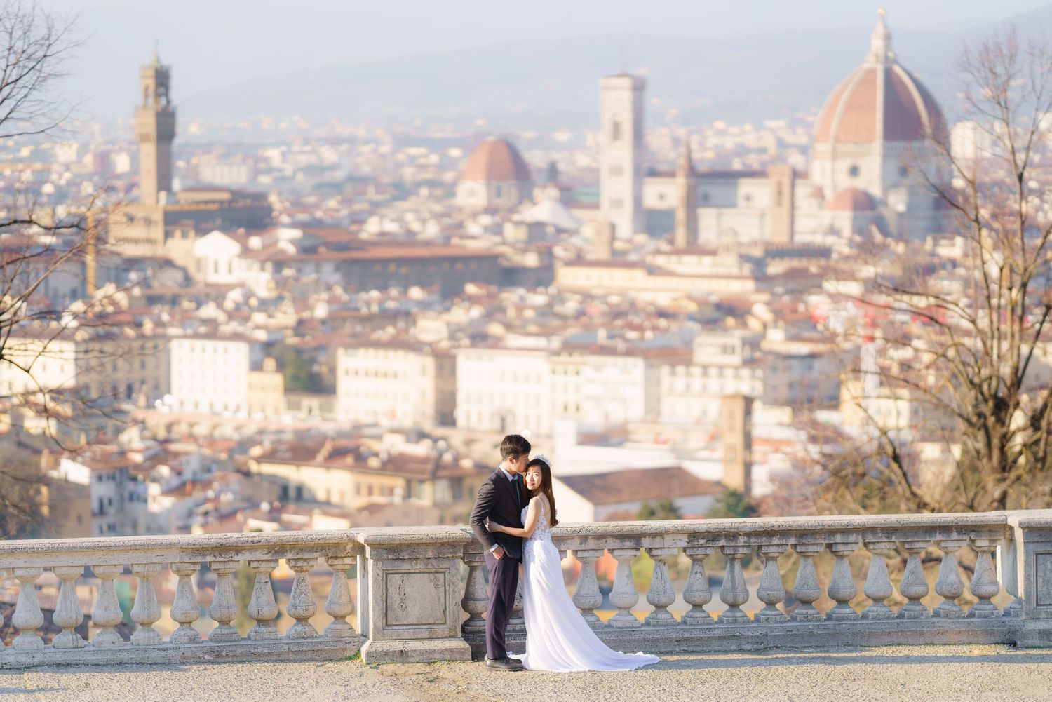 Panoramic view of Florence Italy cityscape with iconic Duomo cathedral dome and surrounding architecture.