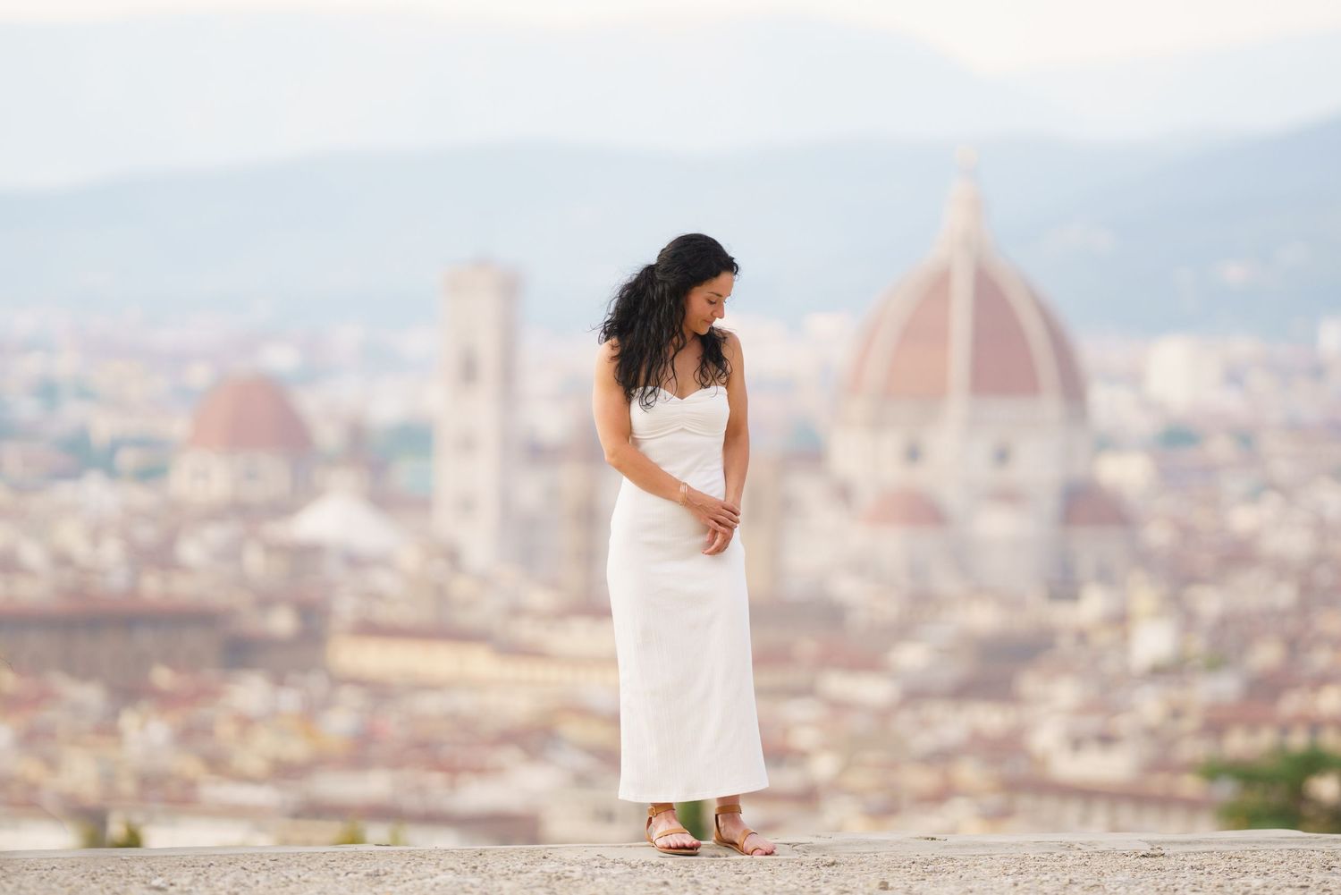 A series of scenic photos showing Florence's iconic skyline and architecture in warm sunset lighting.
