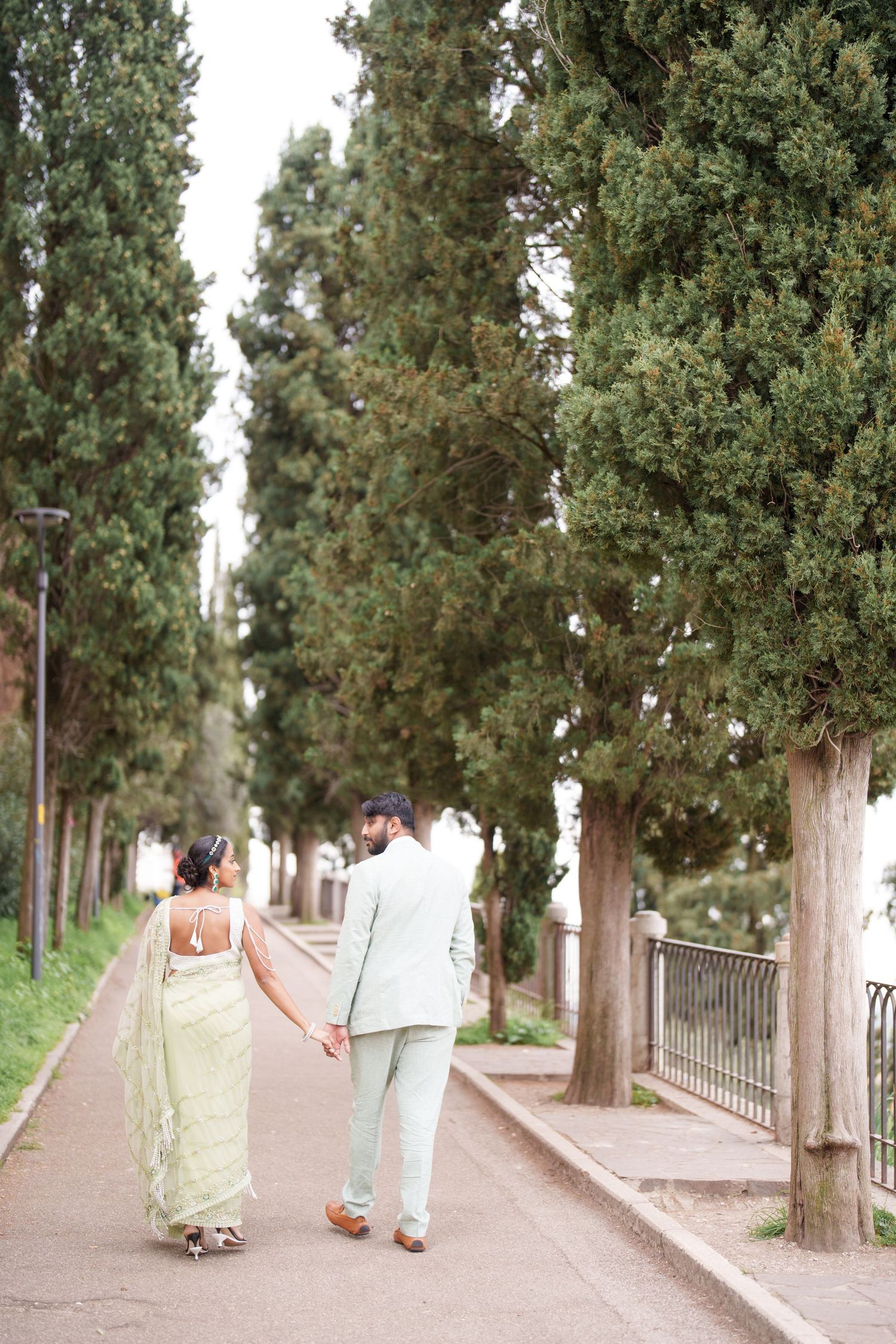 romantic couple walking ponte pietra verona photographer elegant couple photoshoot verona italy