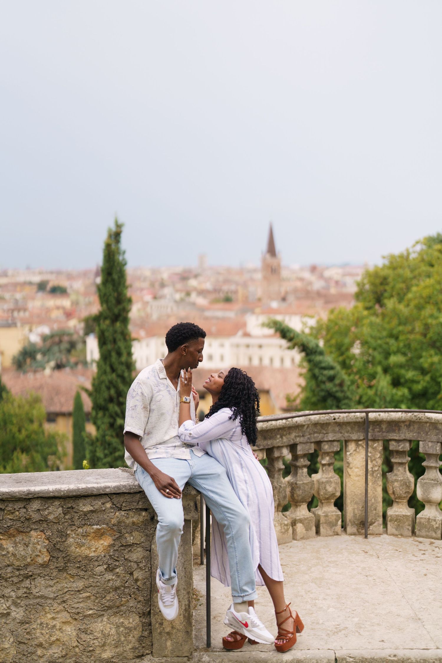 Proposal engagement photographer Verona capturing emotional couple portraits in historic Italian gardens