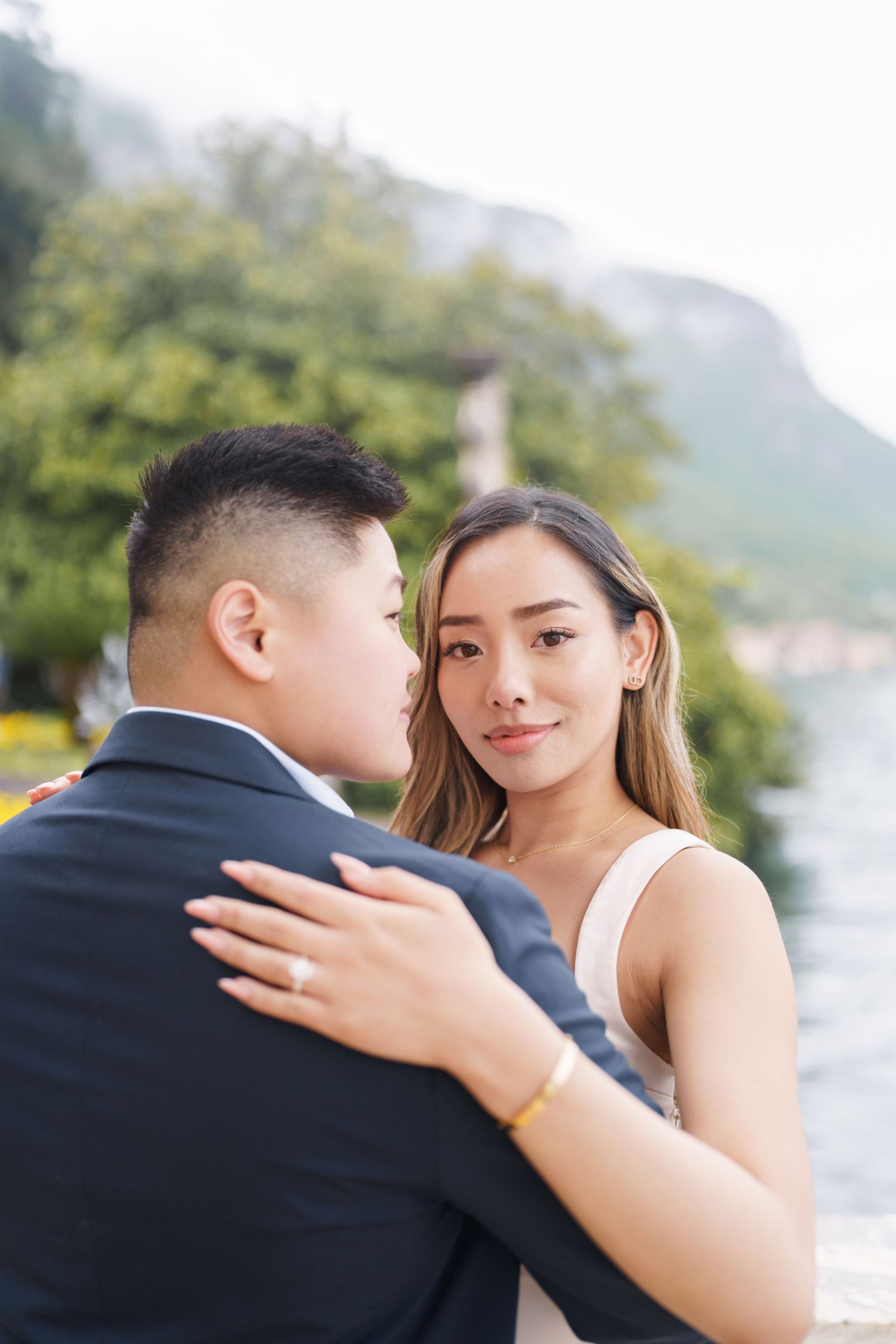 Lake Como proposal photographer capturing surprise engagement at Villa Monastero in Varenna