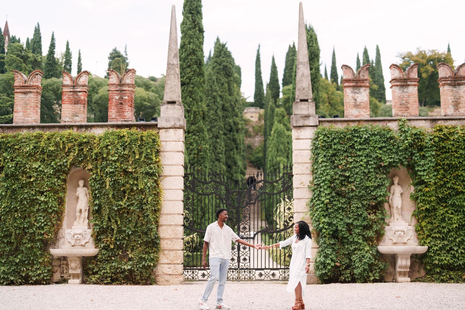 Happy engaged couple at Giardino Giusti Verona photographed by wedding photographer Italy Verona