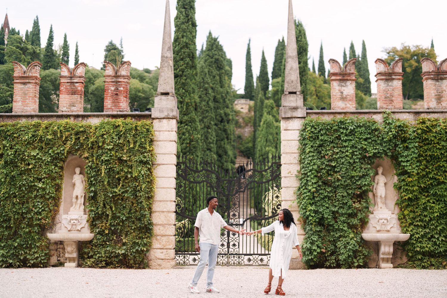 Happy engaged couple at Giardino Giusti Verona photographed by wedding photographer Italy Verona