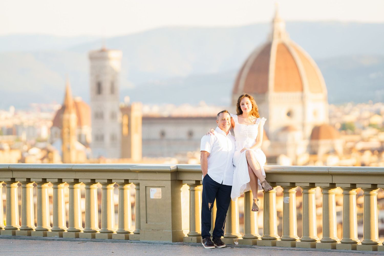 Panoramic view of Florence's skyline featuring the iconic Duomo cathedral and surrounding architecture.