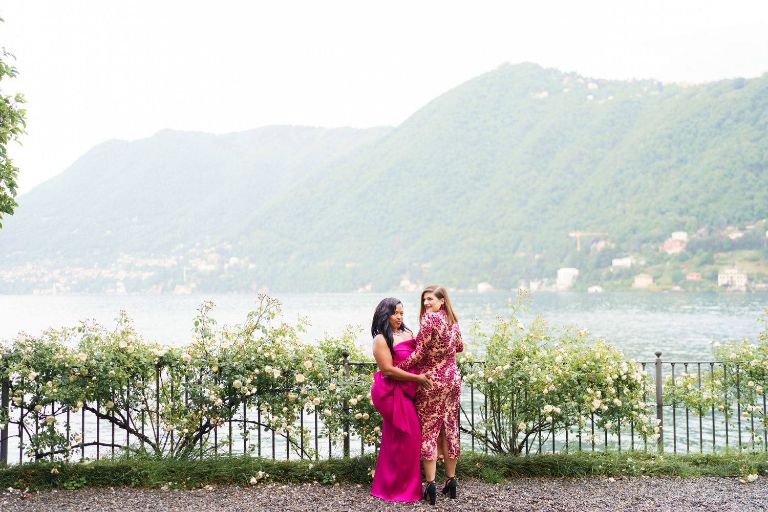 Elegant women group portrait overlooking Lake Como celebration