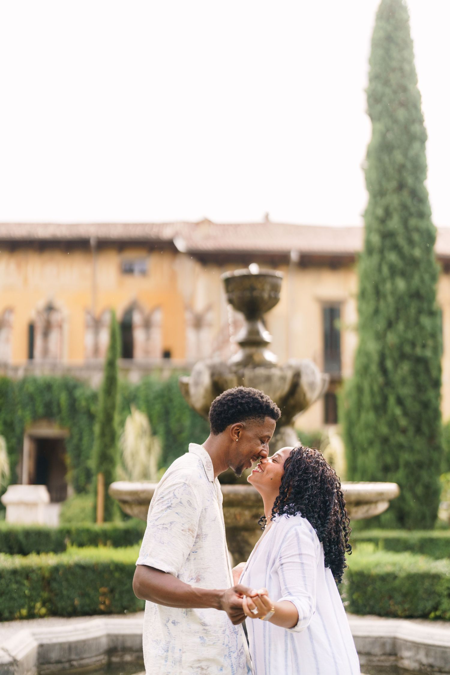 Surprise engagement proposal in Verona captured in cinematic and elegant photography style