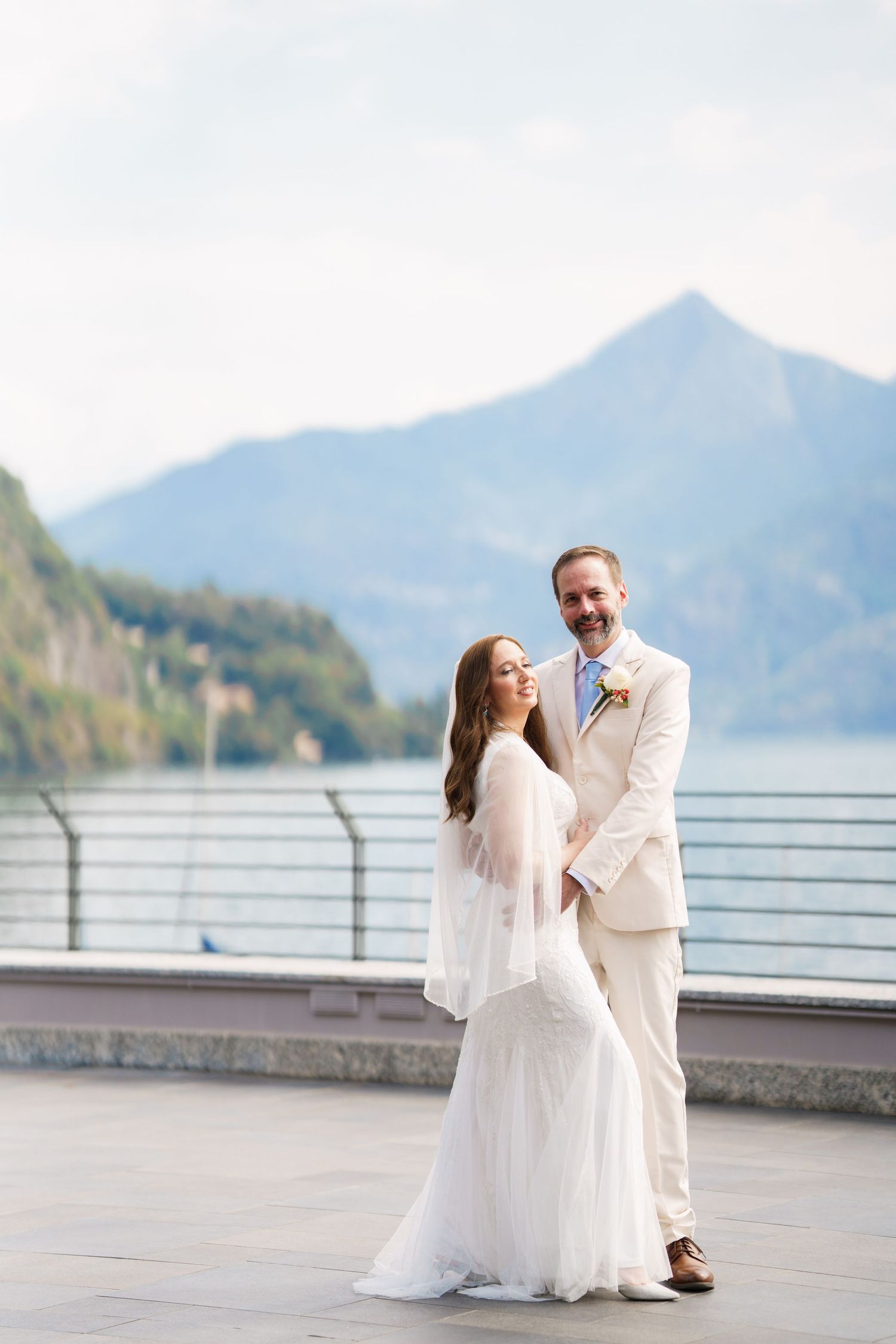 Destination wedding couple photographed on the Lake Como waterfront