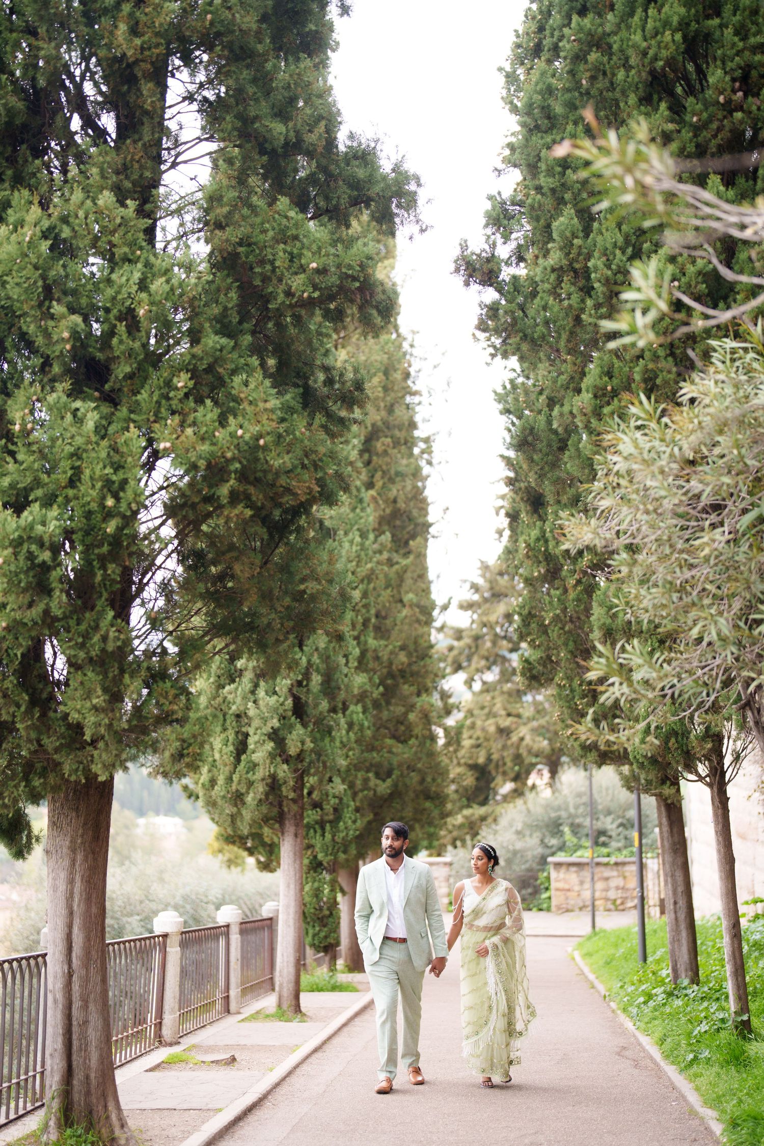 photographer verona romantic couple walking ponte pietra verona photographer elegant couple photoshoot verona italy