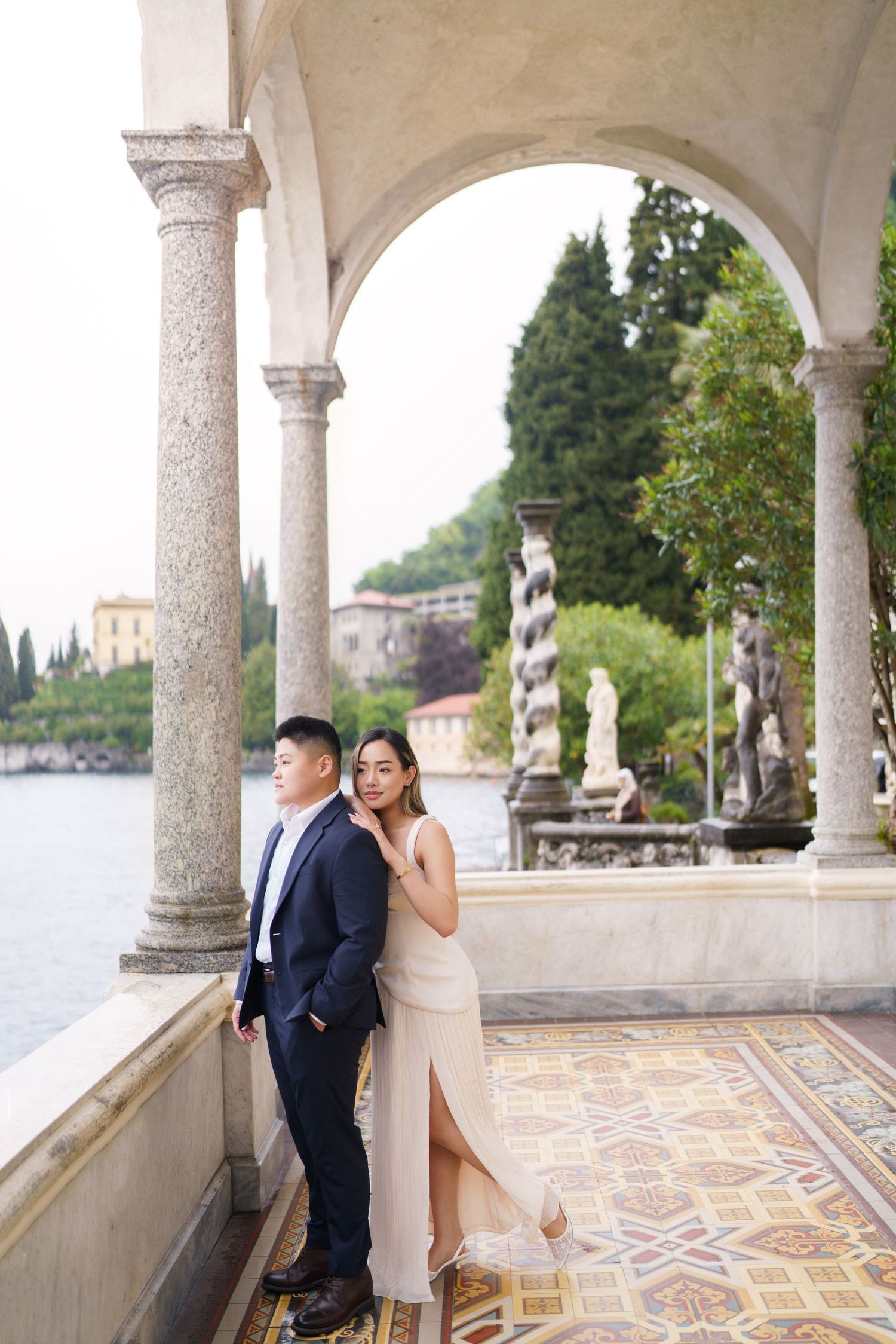 Lake Como proposal photographer capturing surprise engagement at Villa Monastero in Varenna
