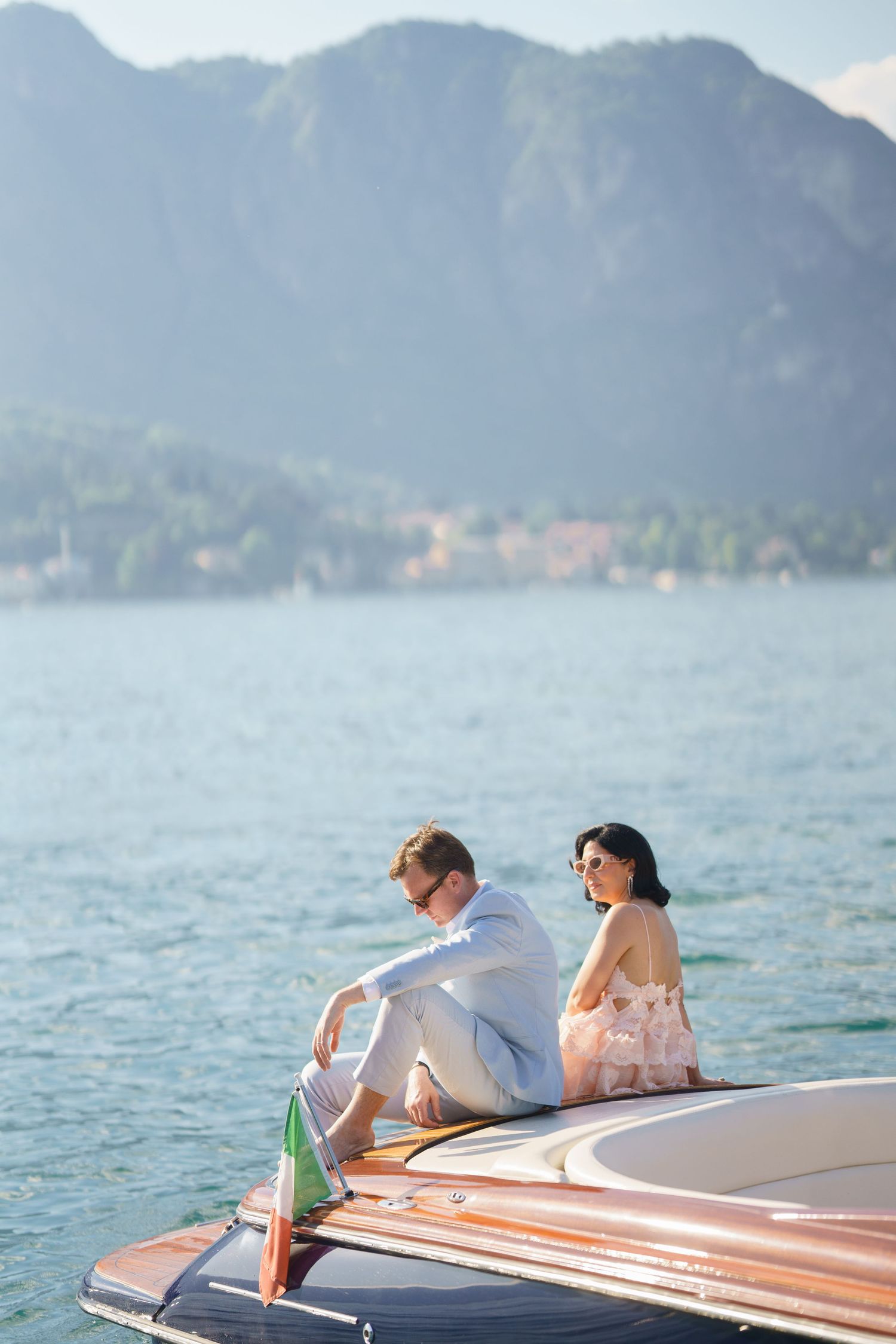 luxury lake como photoshoot with classic wooden boat