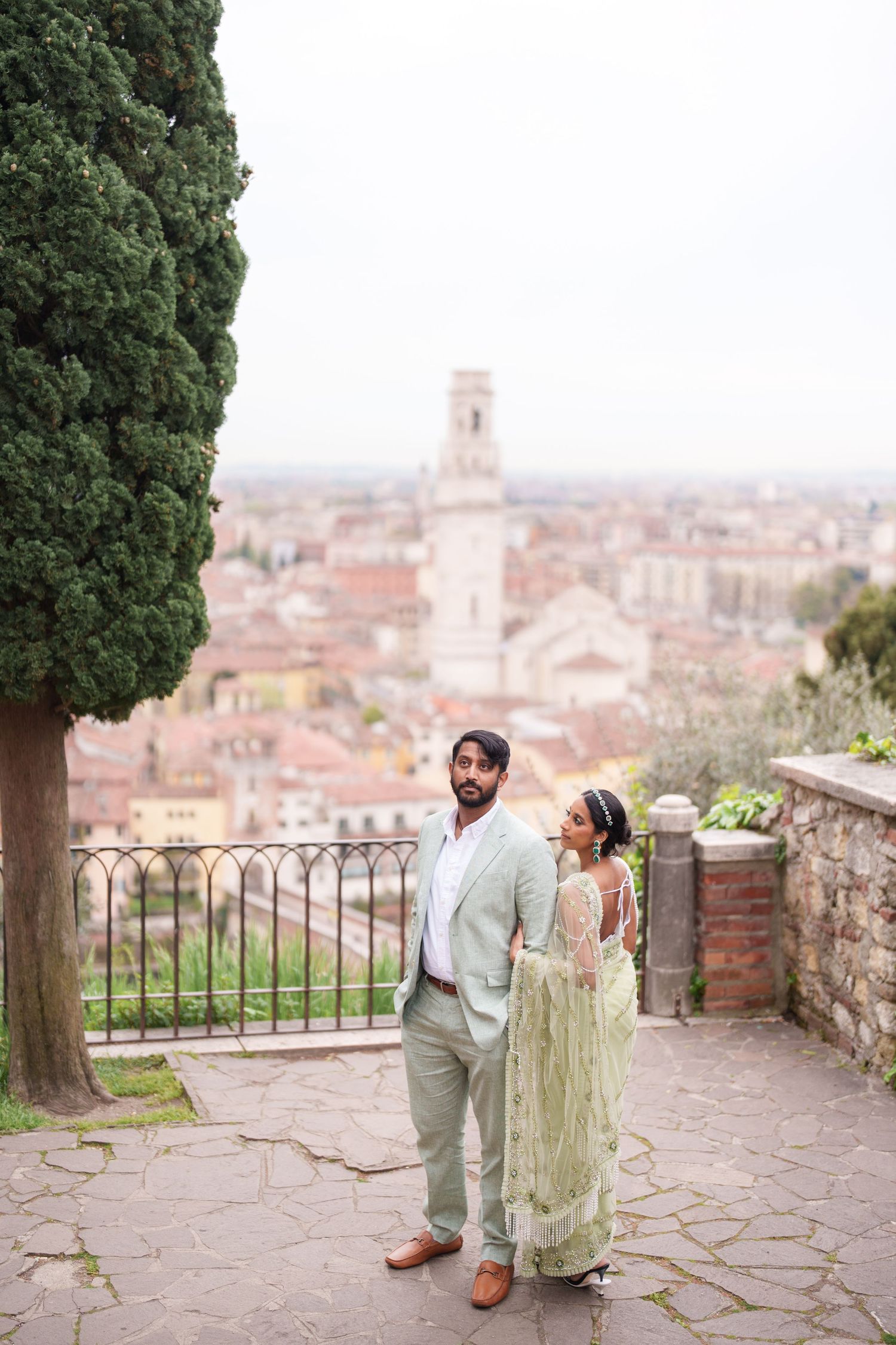 romantic couple walking ponte pietra verona photographer elegant couple photoshoot verona italy