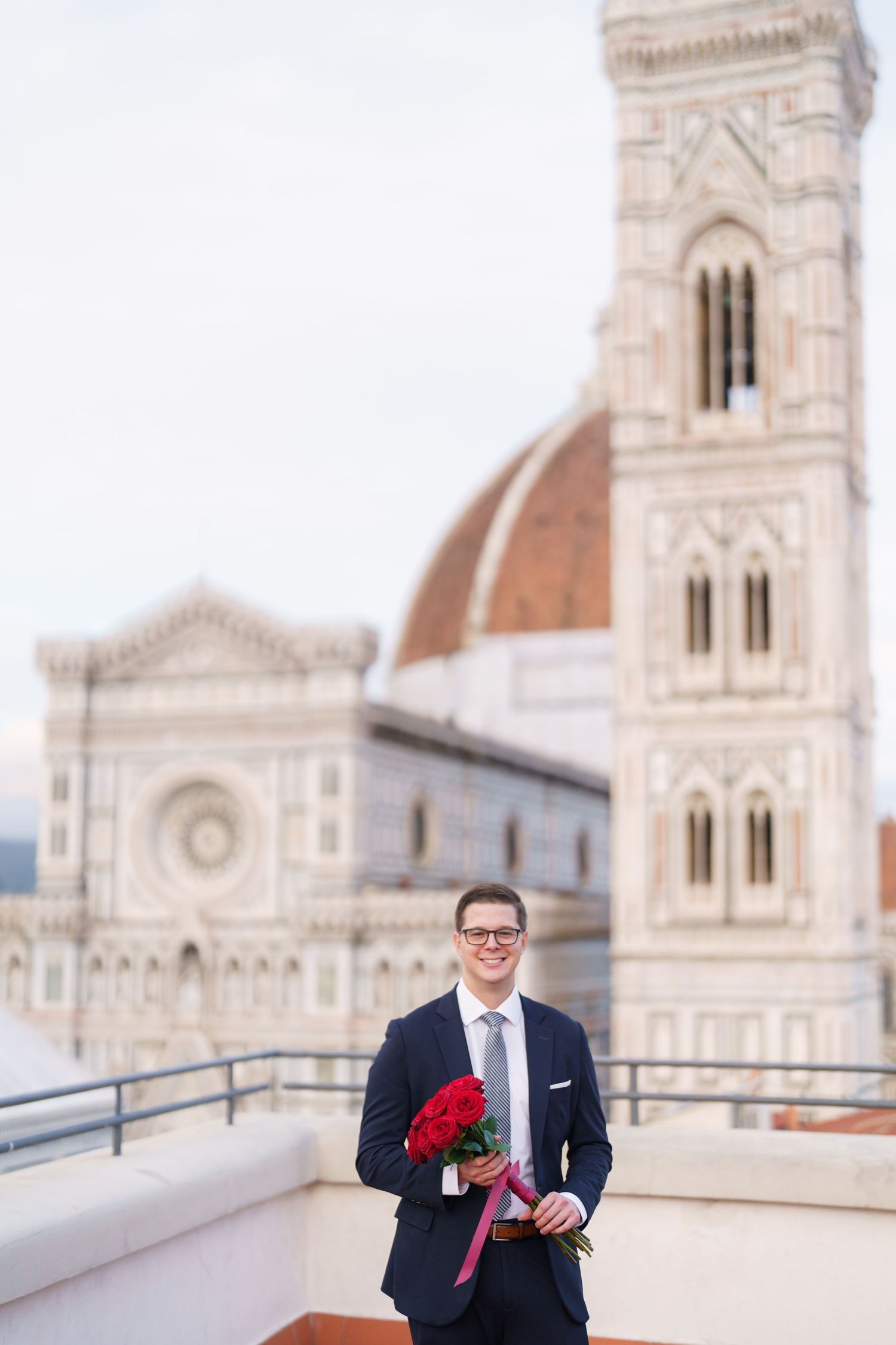 Elegant wedding scene at Florence Cathedral with Brunelleschi's Dome and Giotto's Bell Tower in background.