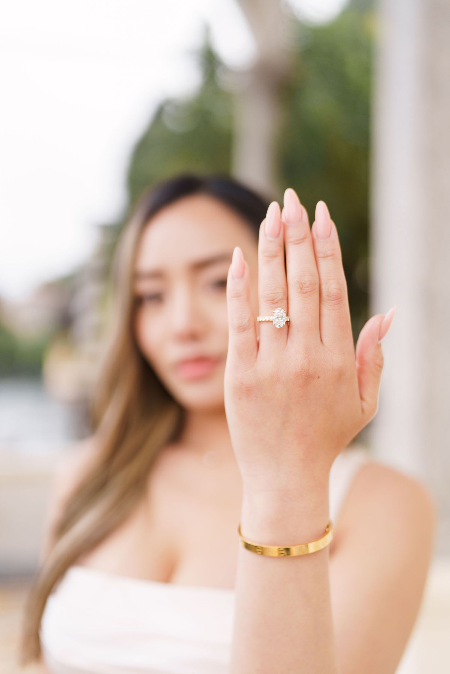 Lake Como proposal photographer capturing surprise engagement at Villa Monastero in Varenna