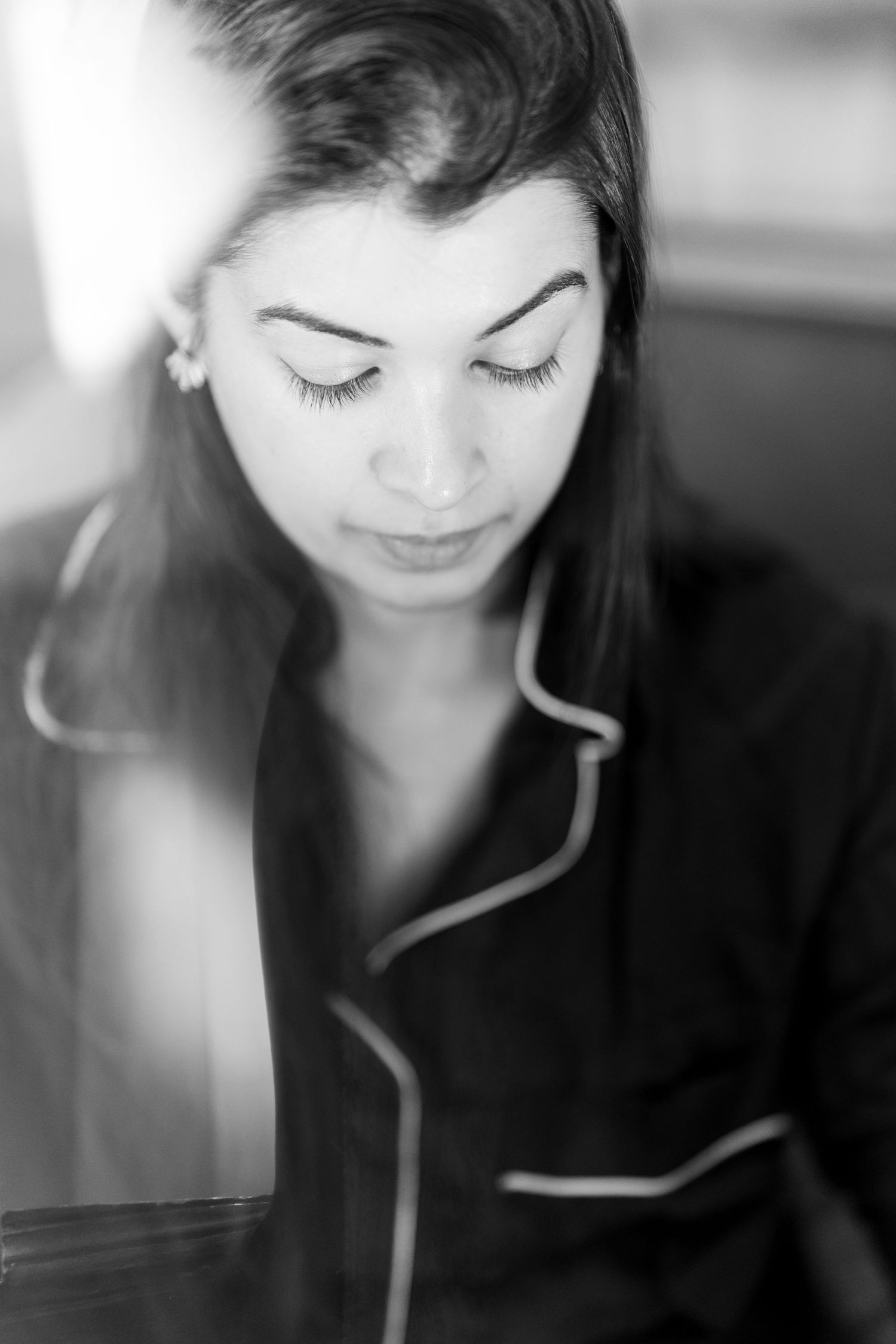 Soft focus black and white portraits showing gentle contemplative moments.