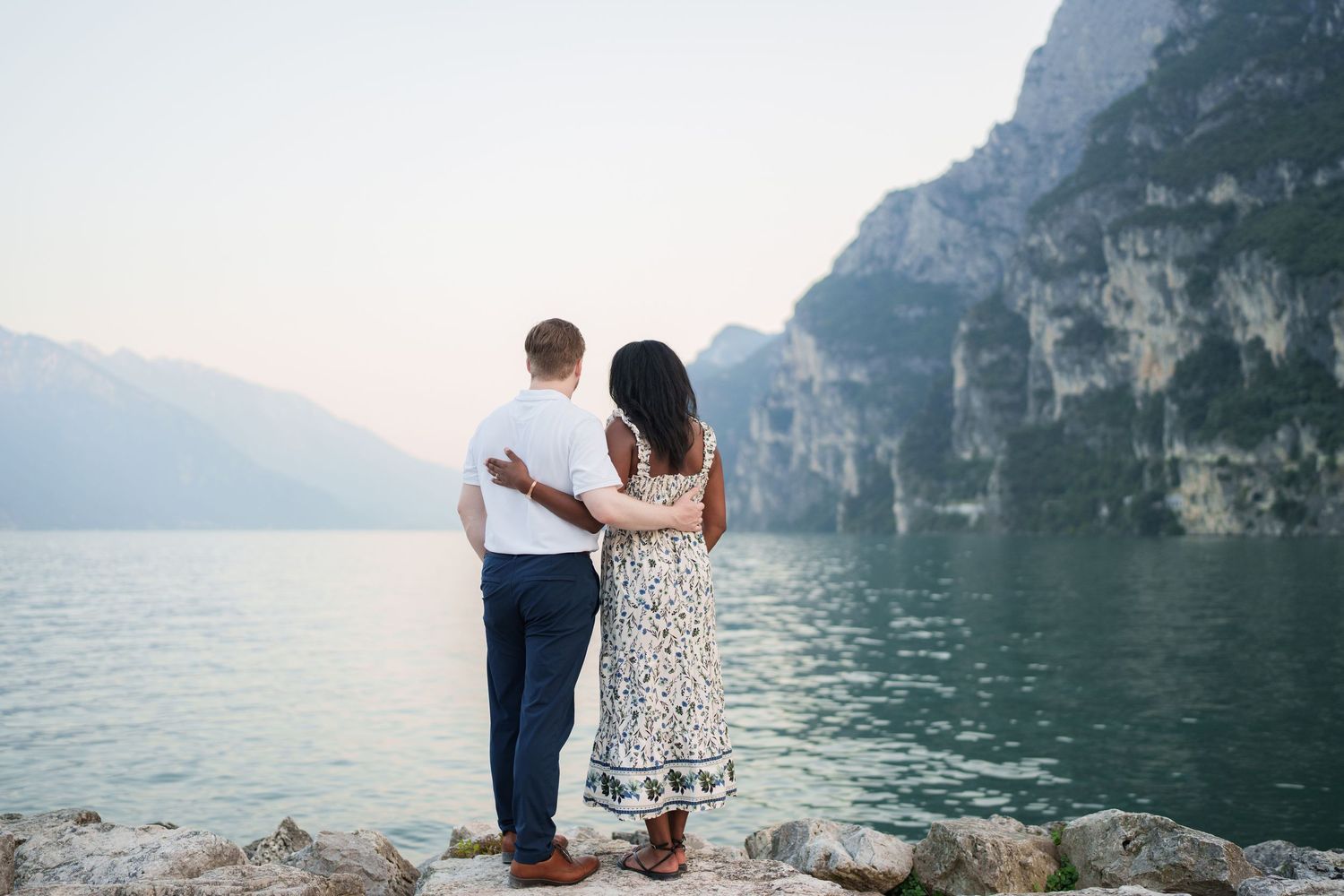 Emotional reaction during a surprise proposal beside Lake Garda in Riva del Garda