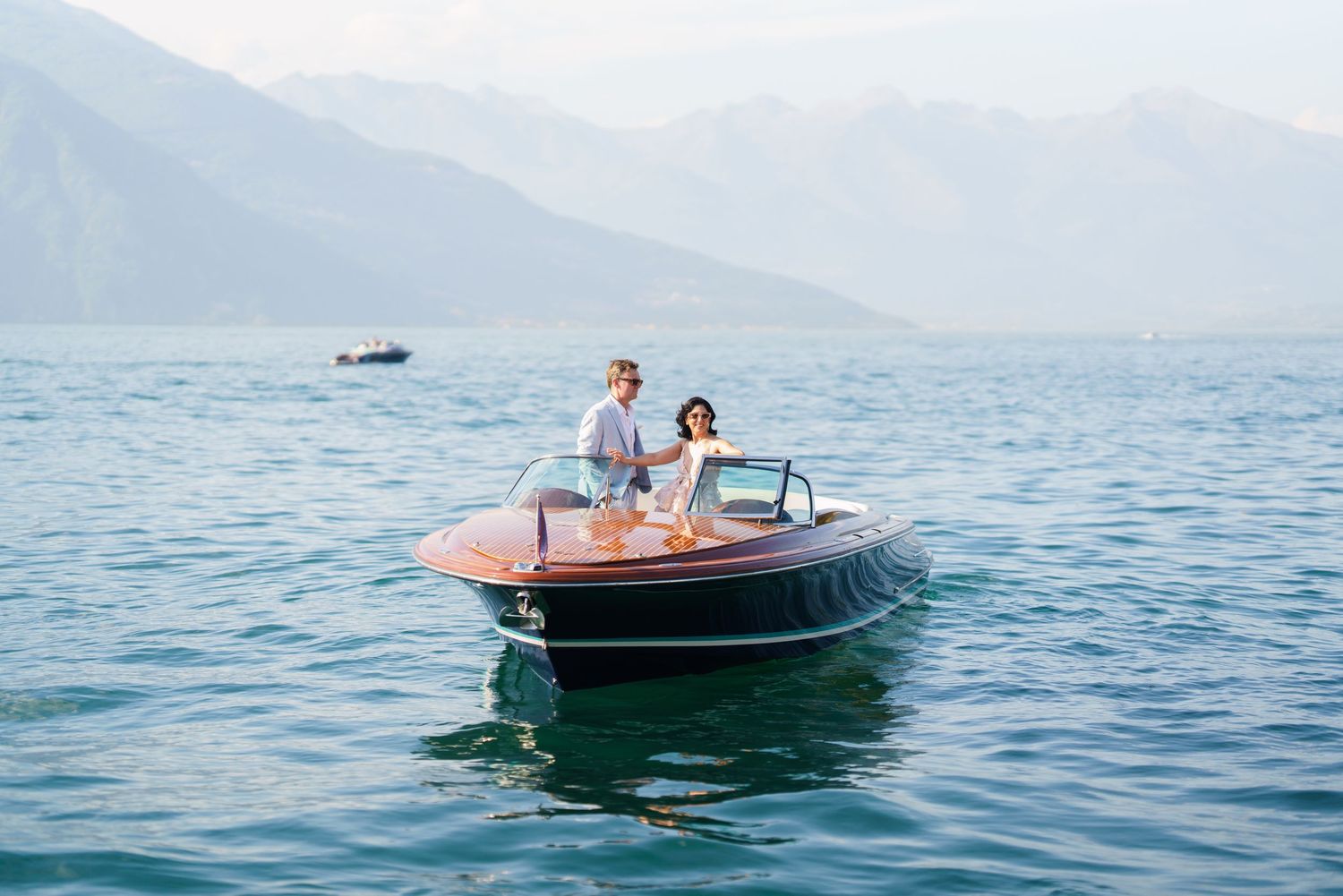 luxury lake como photoshoot with classic wooden boat