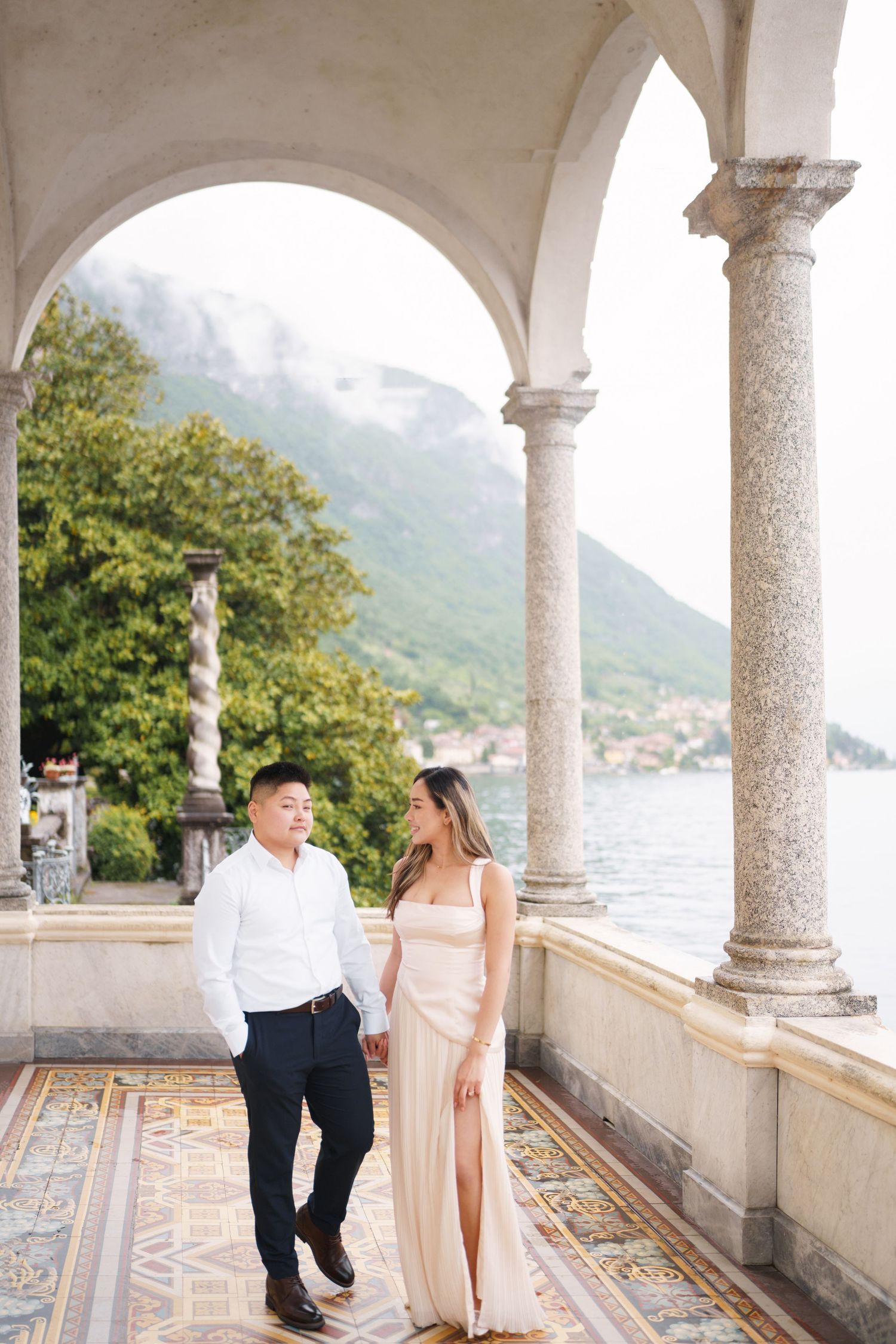 Lake Como proposal photographer capturing surprise engagement at Villa Monastero in Varenna