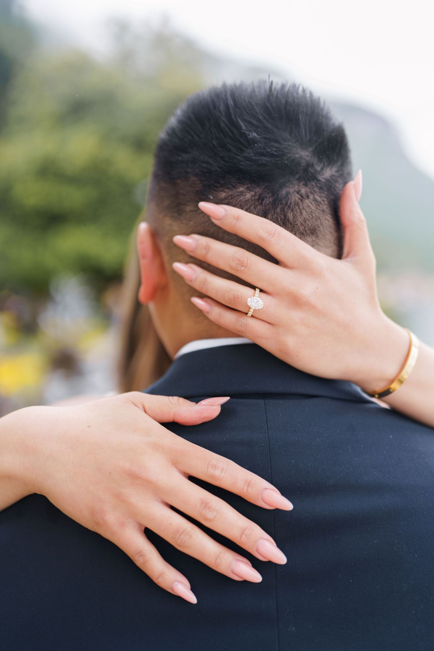 Lake Como proposal photographer capturing surprise engagement at Villa Monastero in Varenna