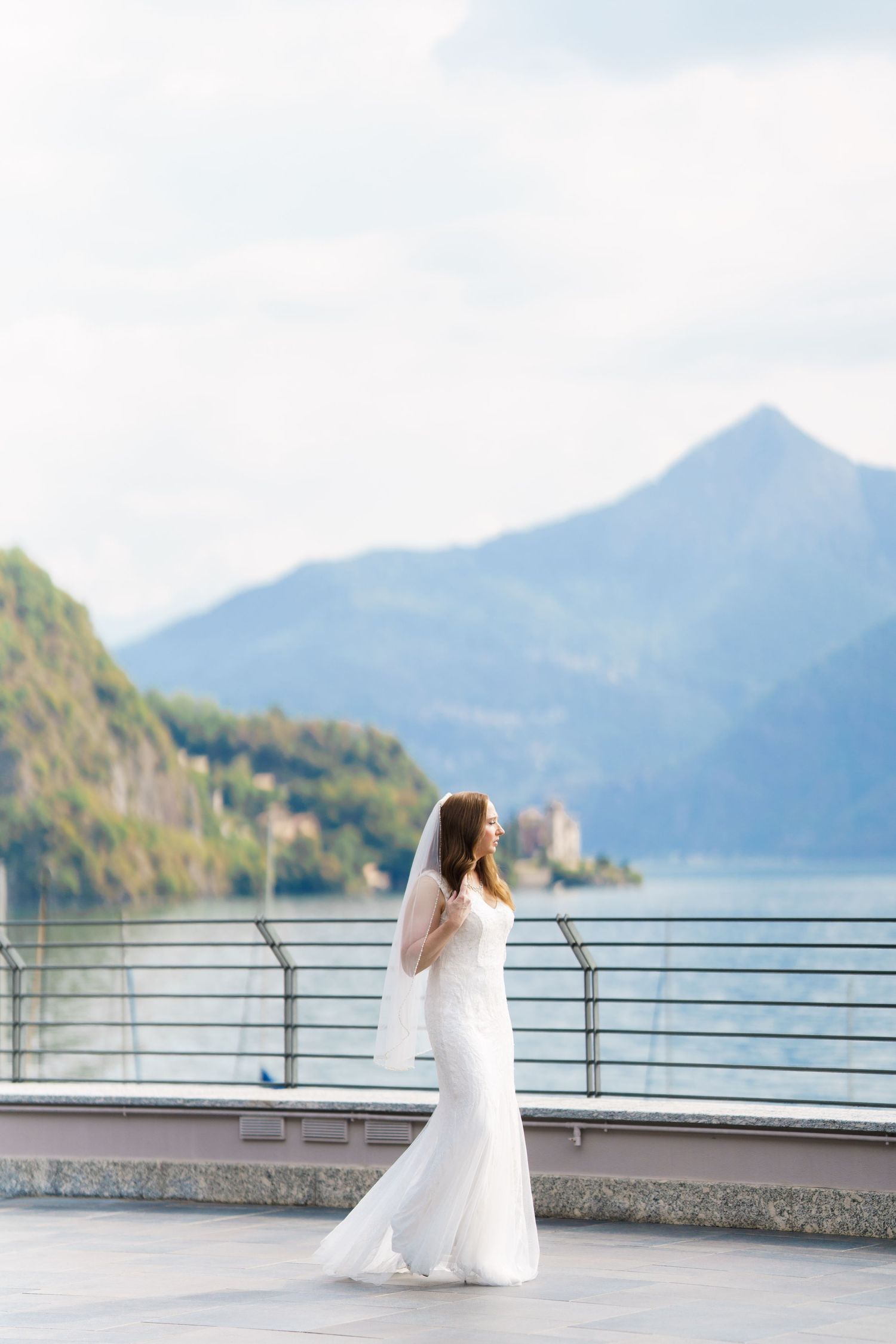 Romantic wedding portrait with Lake Como mountains in the background