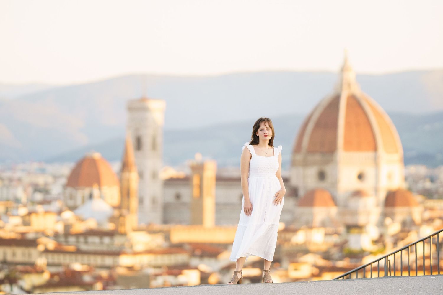 photographer Florence Italy skyline with iconic Duomo cathedral dome and historic architecture at sunset.