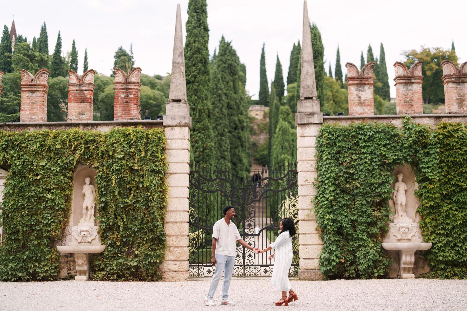 Happy engaged couple at Giardino Giusti Verona photographed by wedding photographer Italy Verona