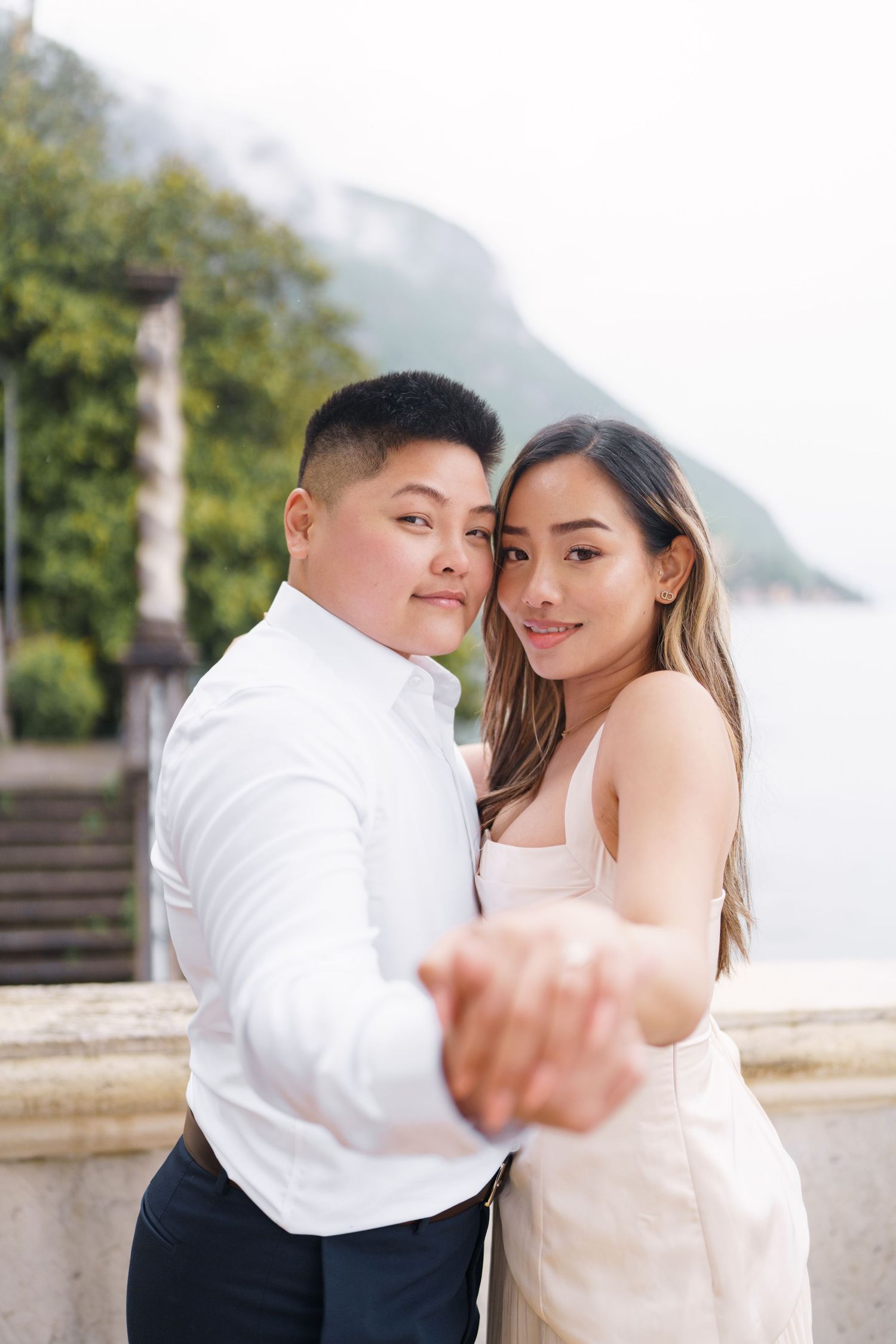 Lake Como proposal photographer capturing surprise engagement at Villa Monastero in Varenna