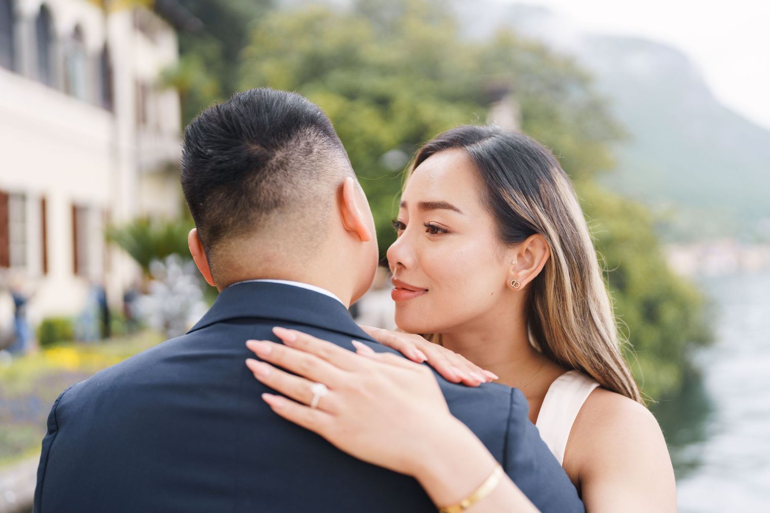 Lake Como proposal photographer capturing surprise engagement at Villa Monastero in Varenna
