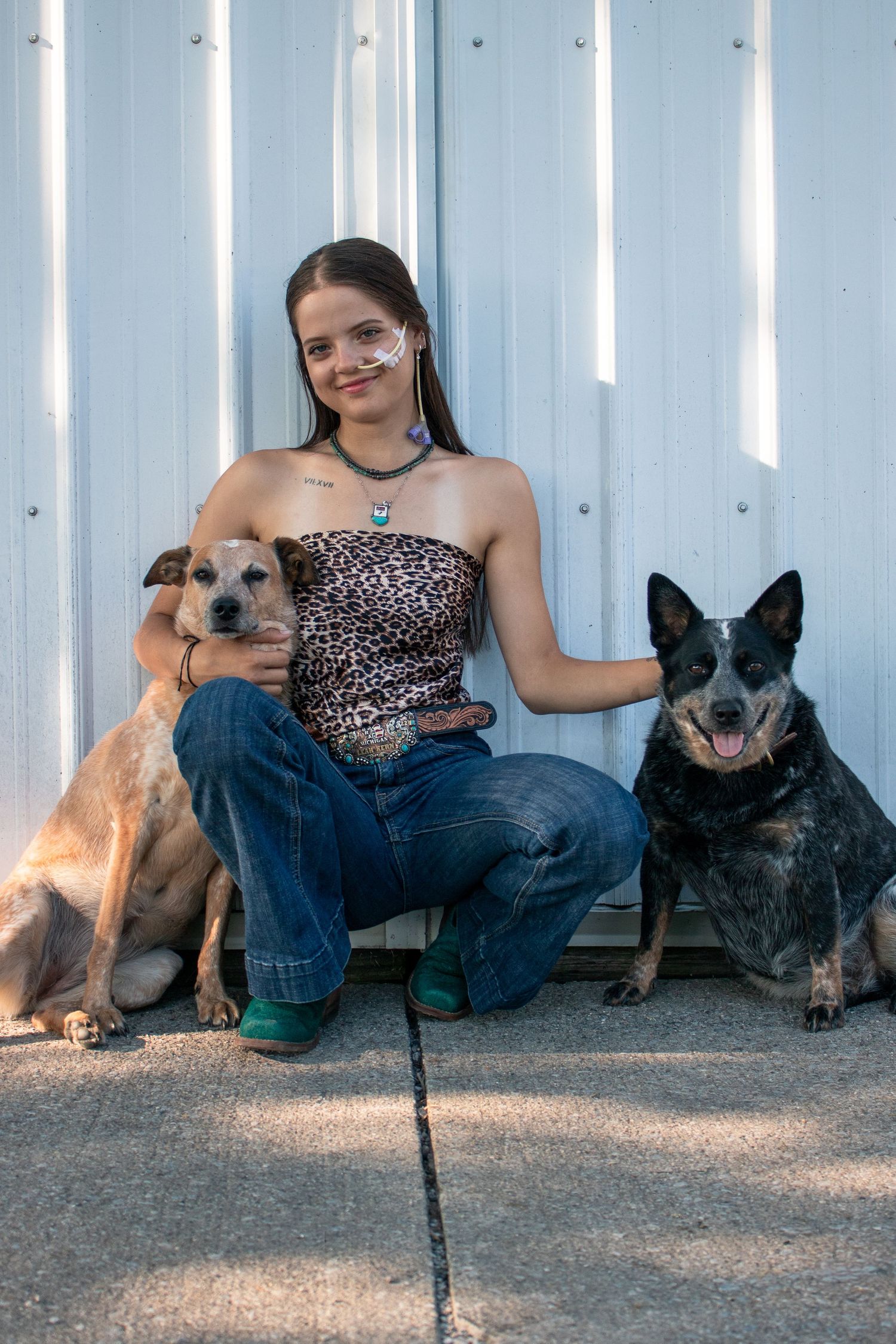 portrait senior photos girl and her dogs